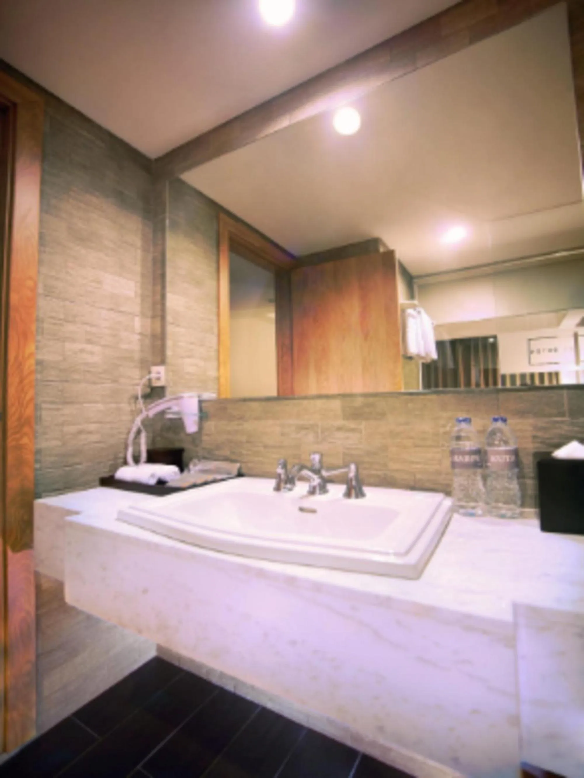 Bathroom in Harper Kuta Hotel by ASTON