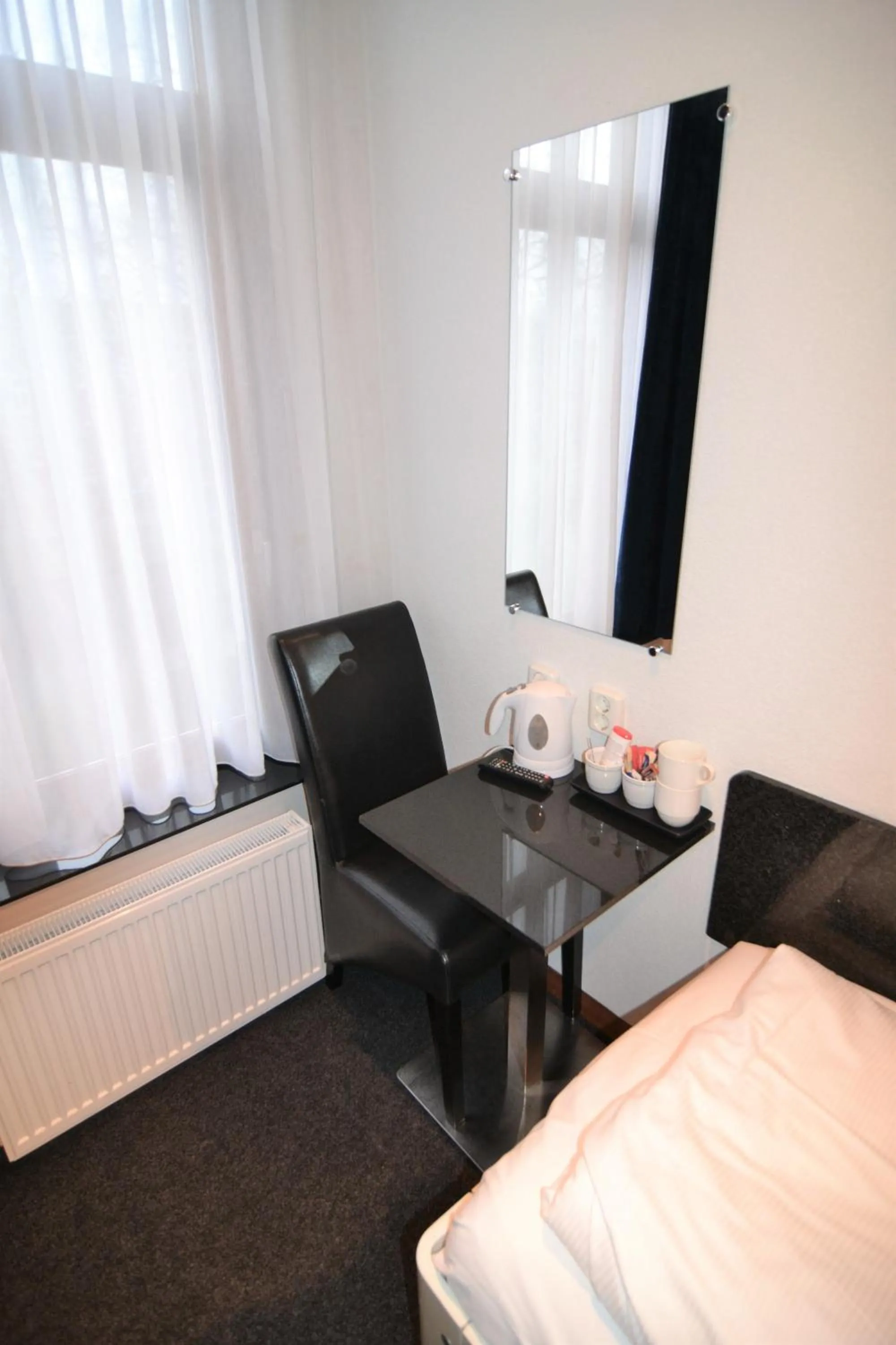 Bed in Hotel Bienvenue