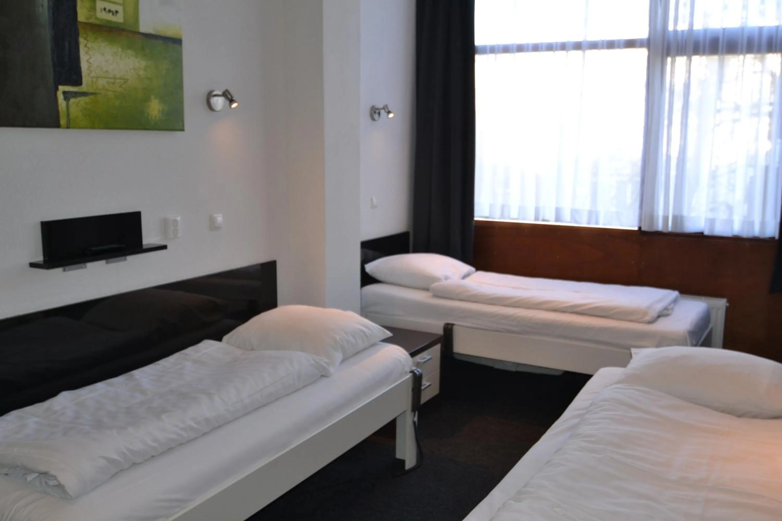 Bed in Hotel Bienvenue