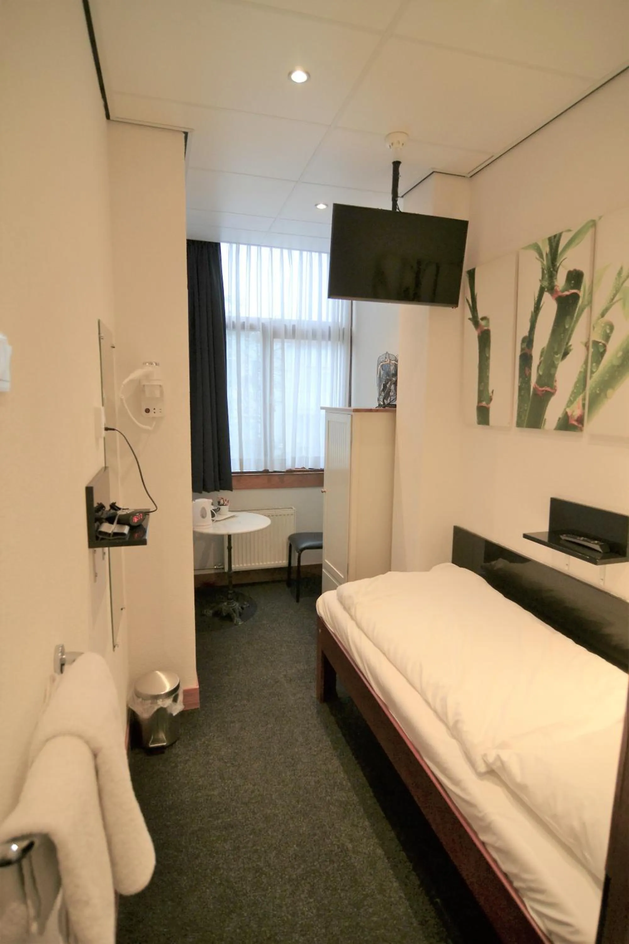 Bed in Hotel Bienvenue