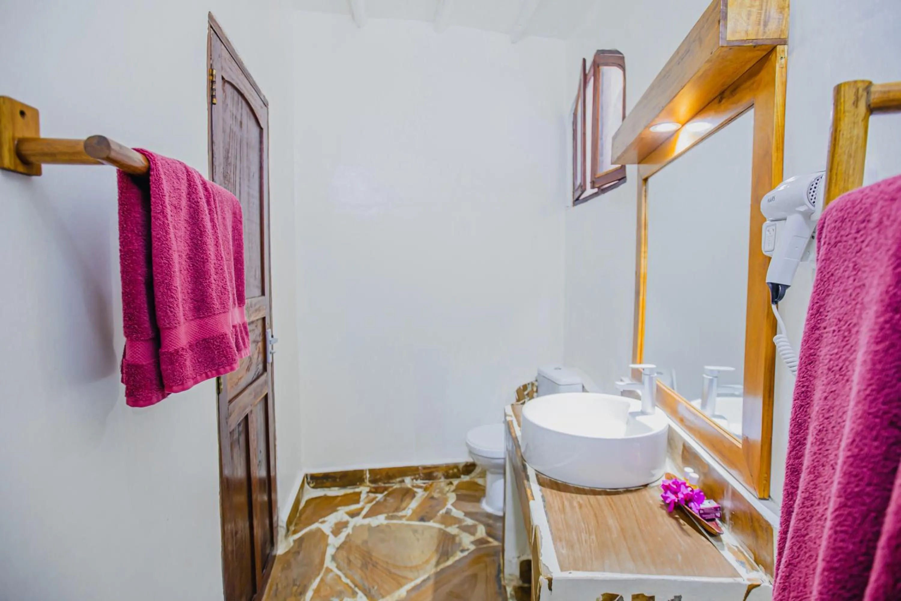 Bathroom in AHG Waridi Beach Resort & SPA