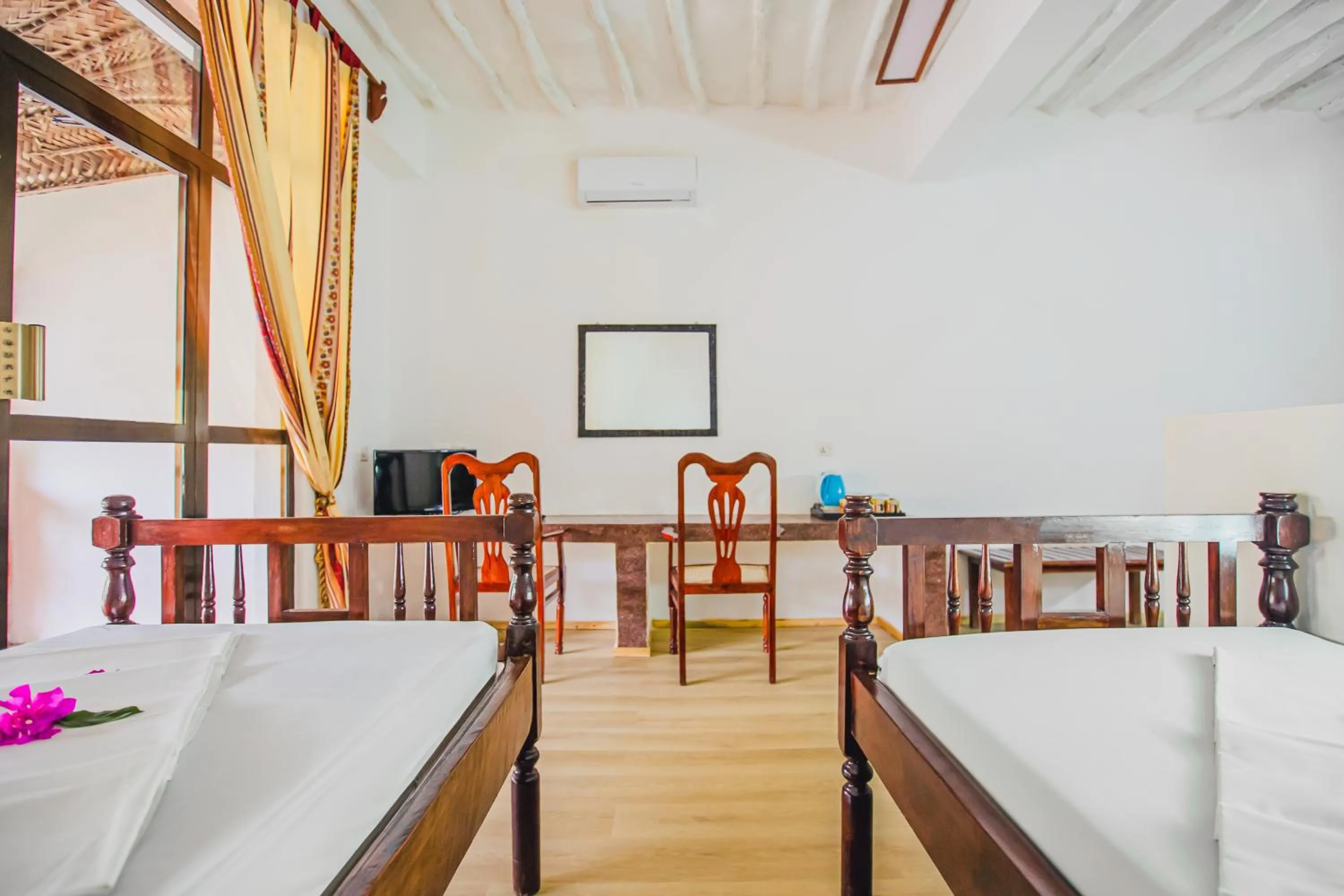 Bed in AHG Waridi Beach Resort & SPA