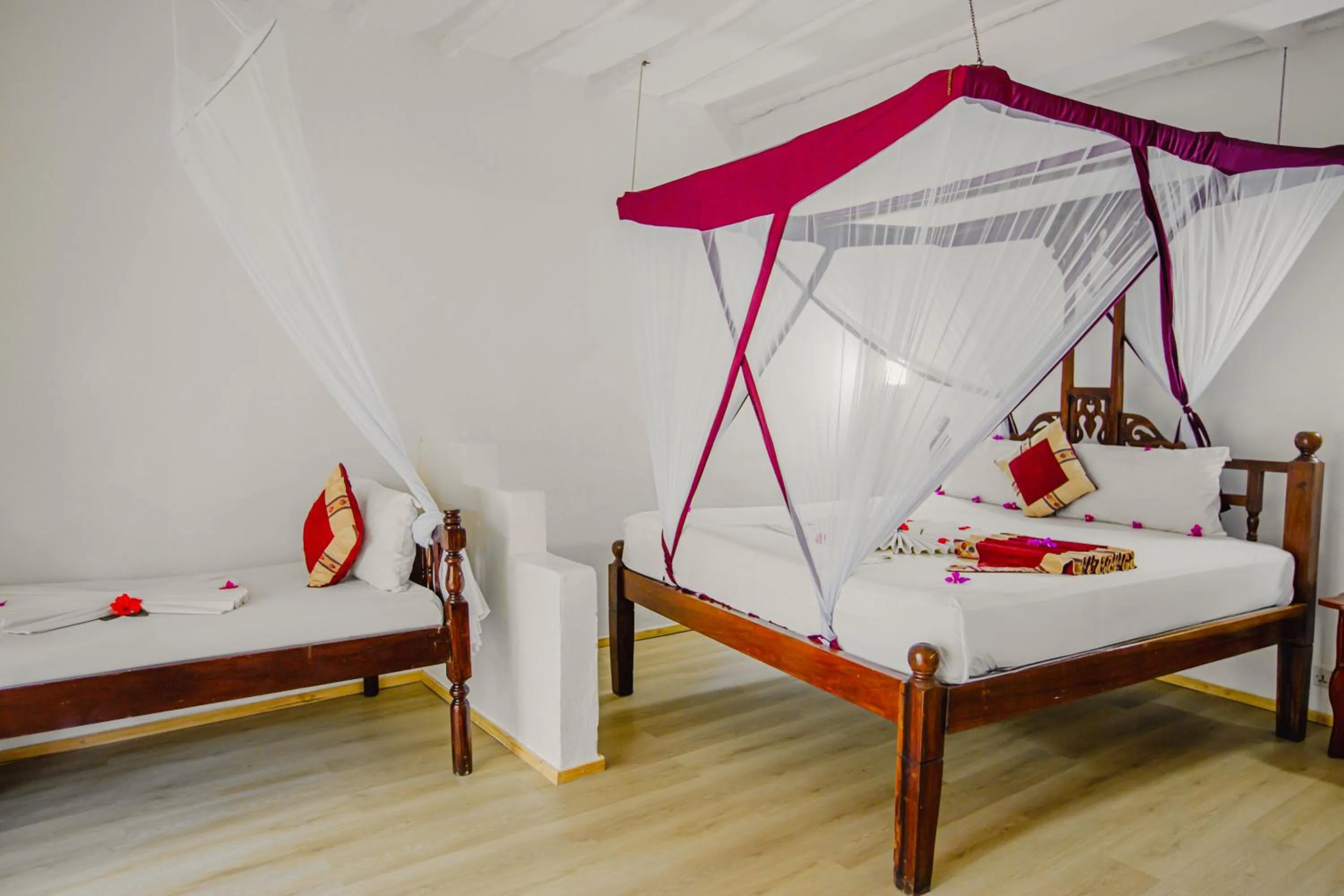 Bed in AHG Waridi Beach Resort & SPA