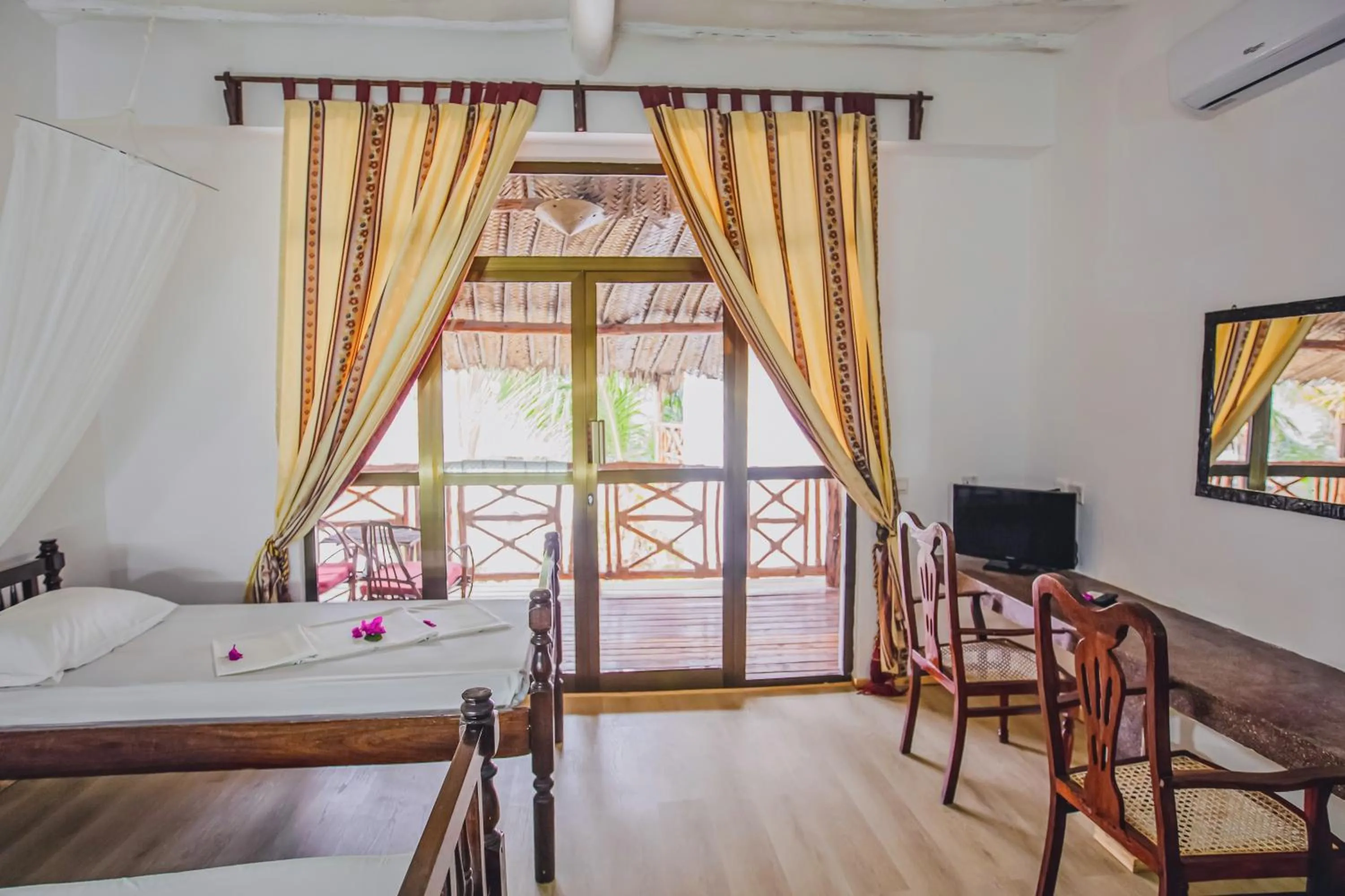 Bed in AHG Waridi Beach Resort & SPA