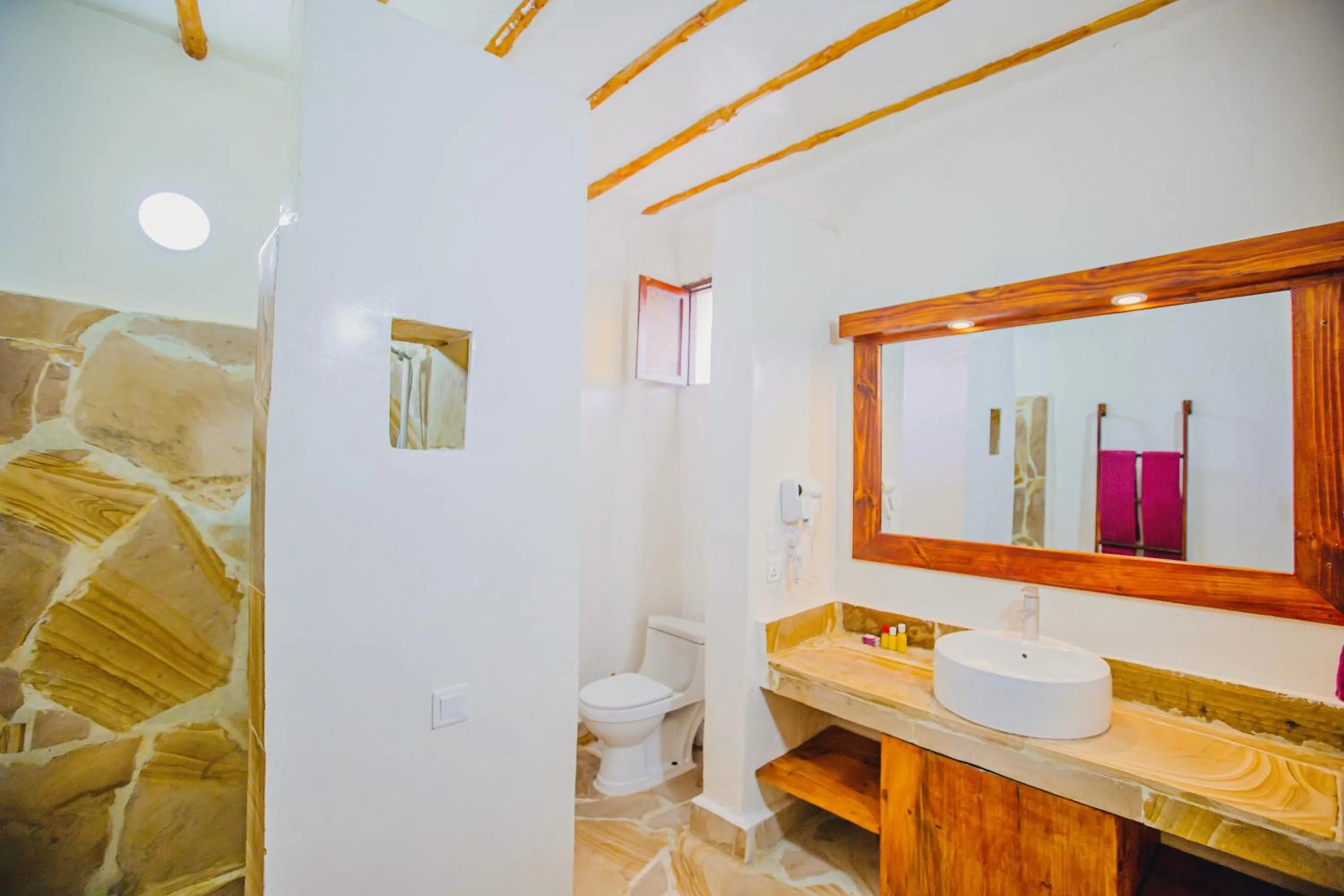Bathroom in AHG Waridi Beach Resort & SPA