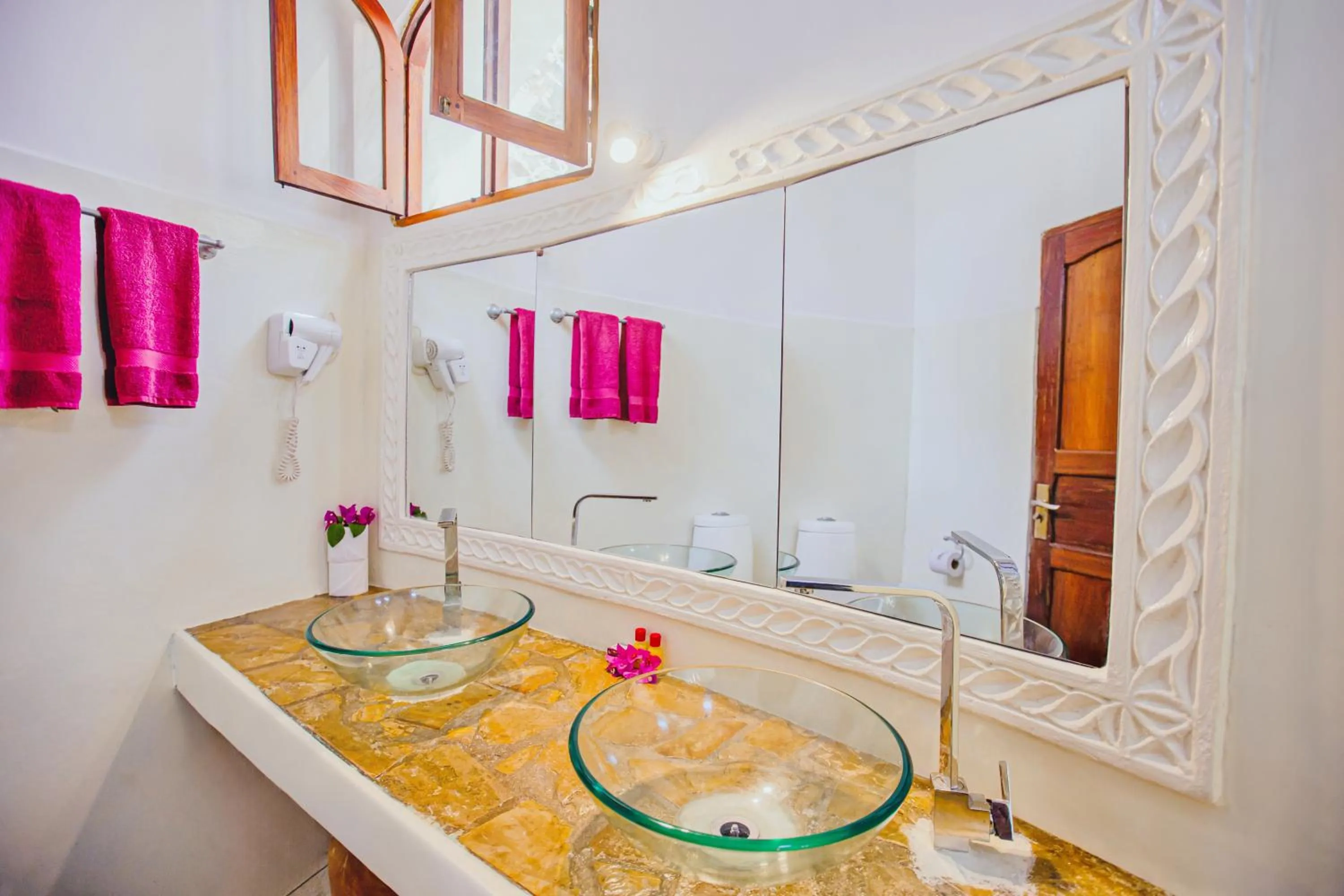 Bathroom in AHG Waridi Beach Resort & SPA