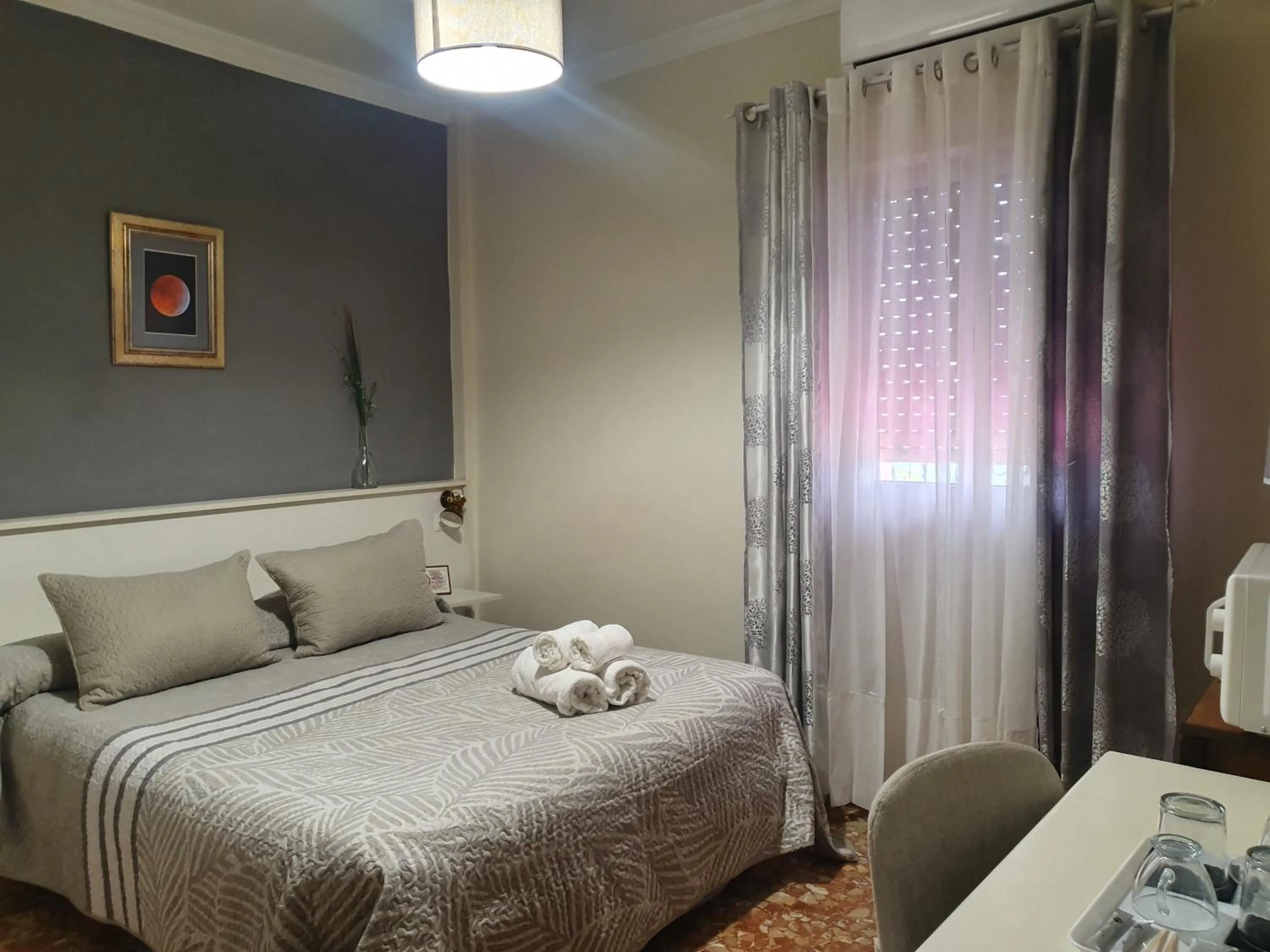 Bed in LUNA-Guest Rooms