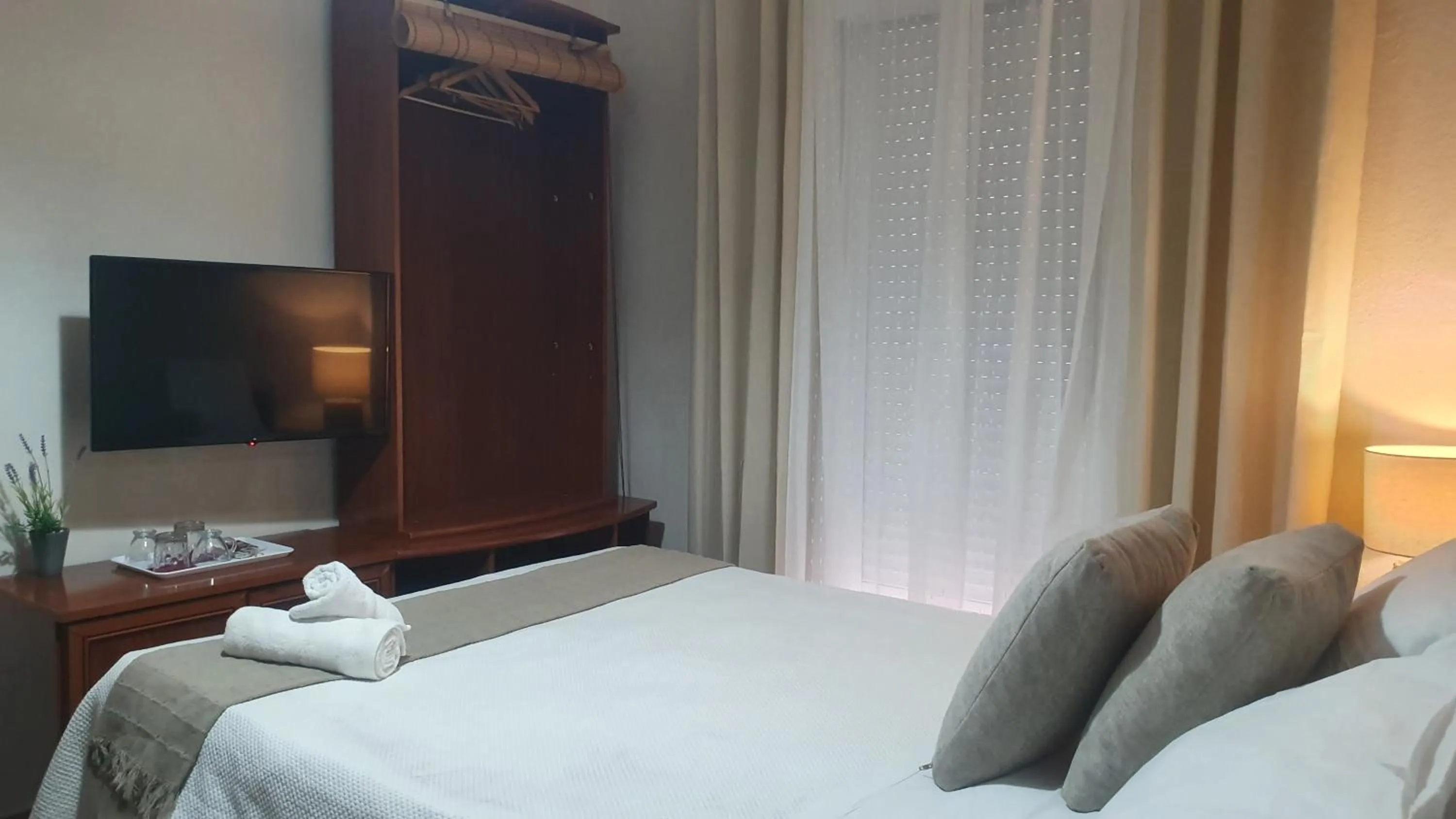 Bed in LUNA-Guest Rooms