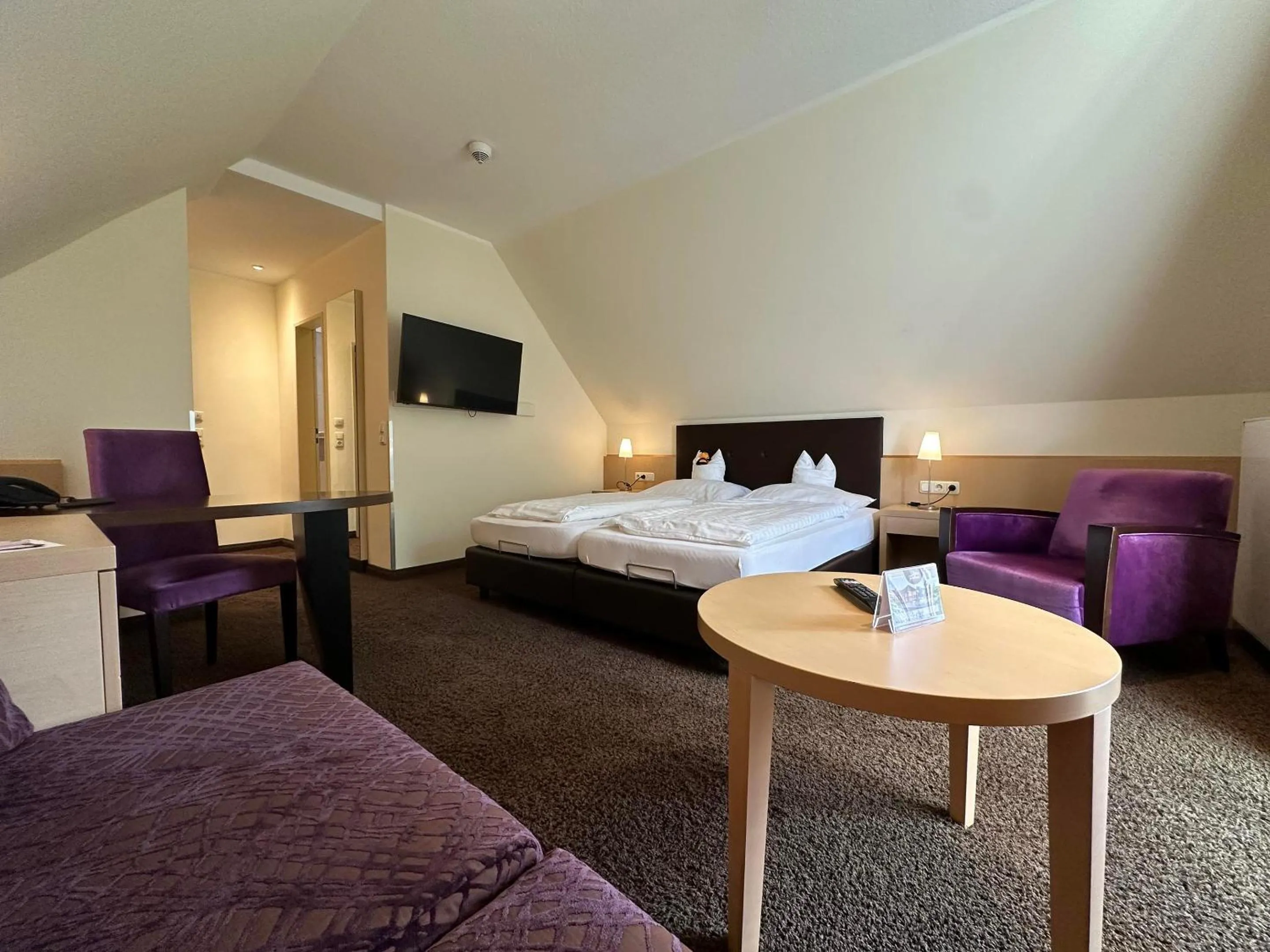 Bed in Köhlers Forsthaus Wellness & Genuss Hotel