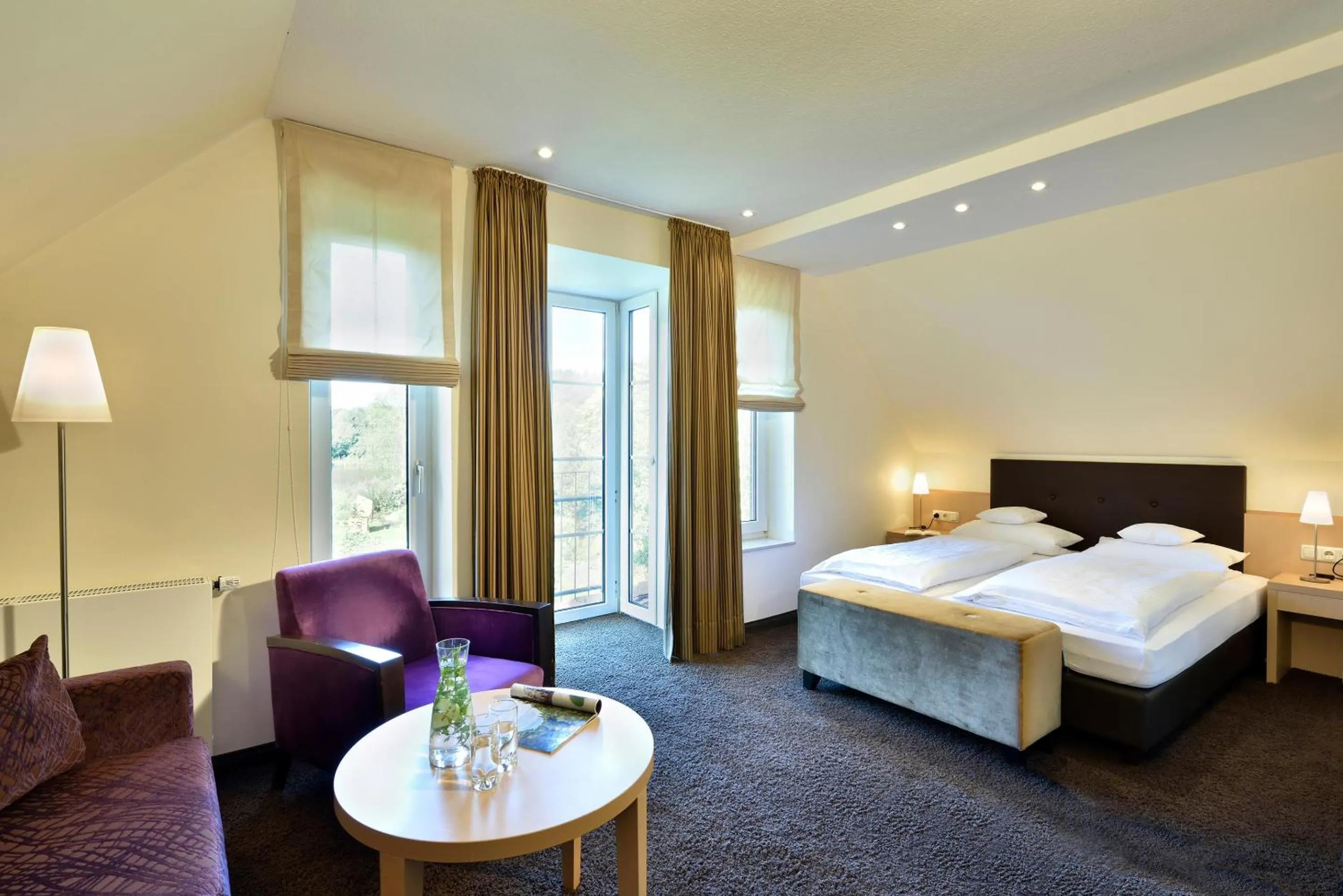 Bed in Köhlers Forsthaus Wellness & Genuss Hotel