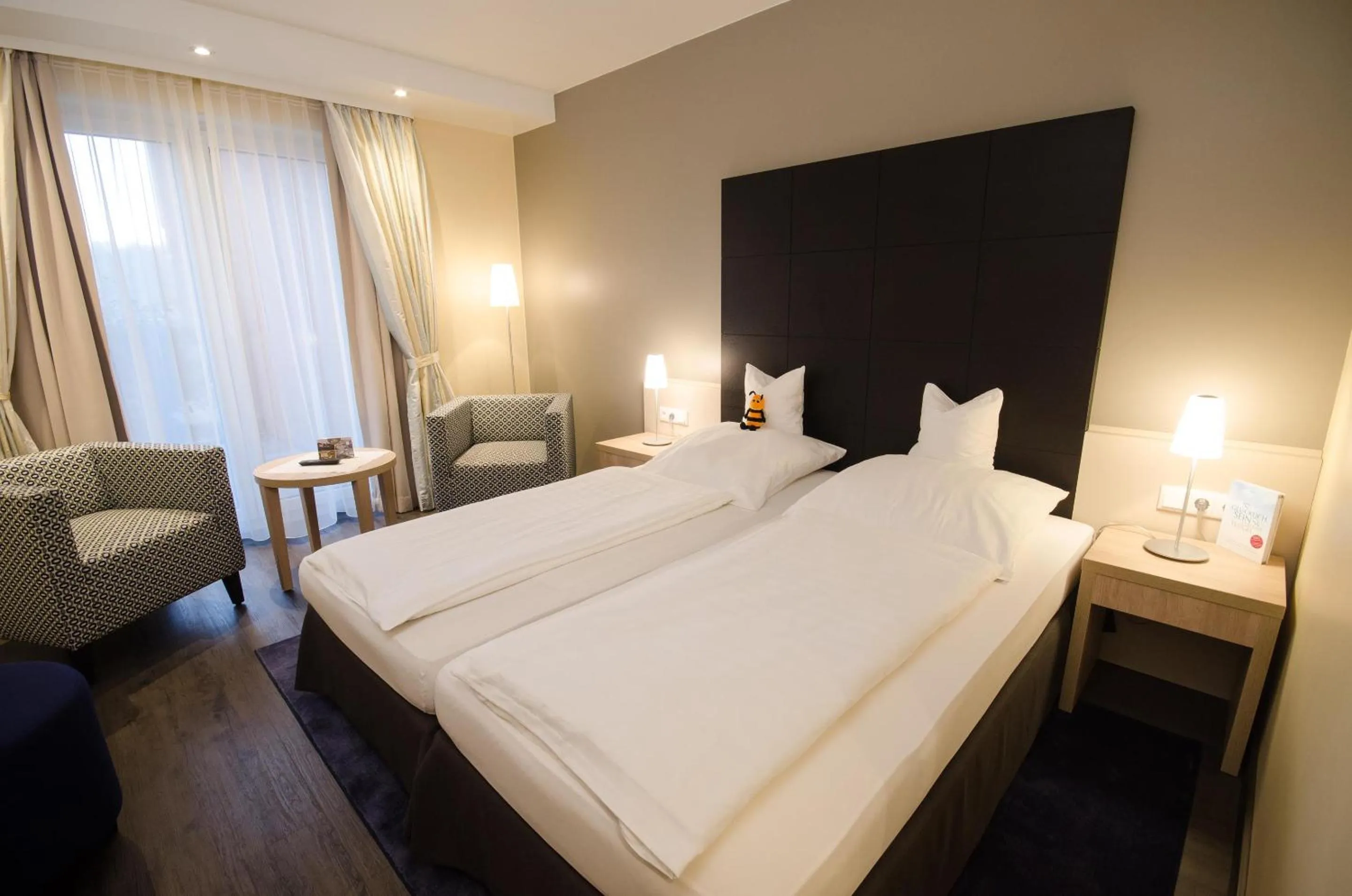 Bed in Köhlers Forsthaus Wellness & Genuss Hotel