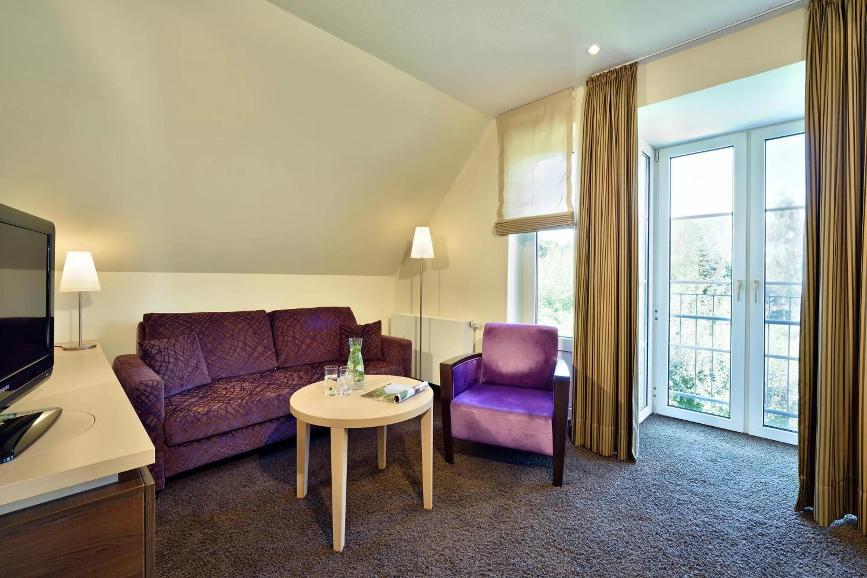 Photo of the whole room, Bed in Köhlers Forsthaus Wellness & Genuss Hotel