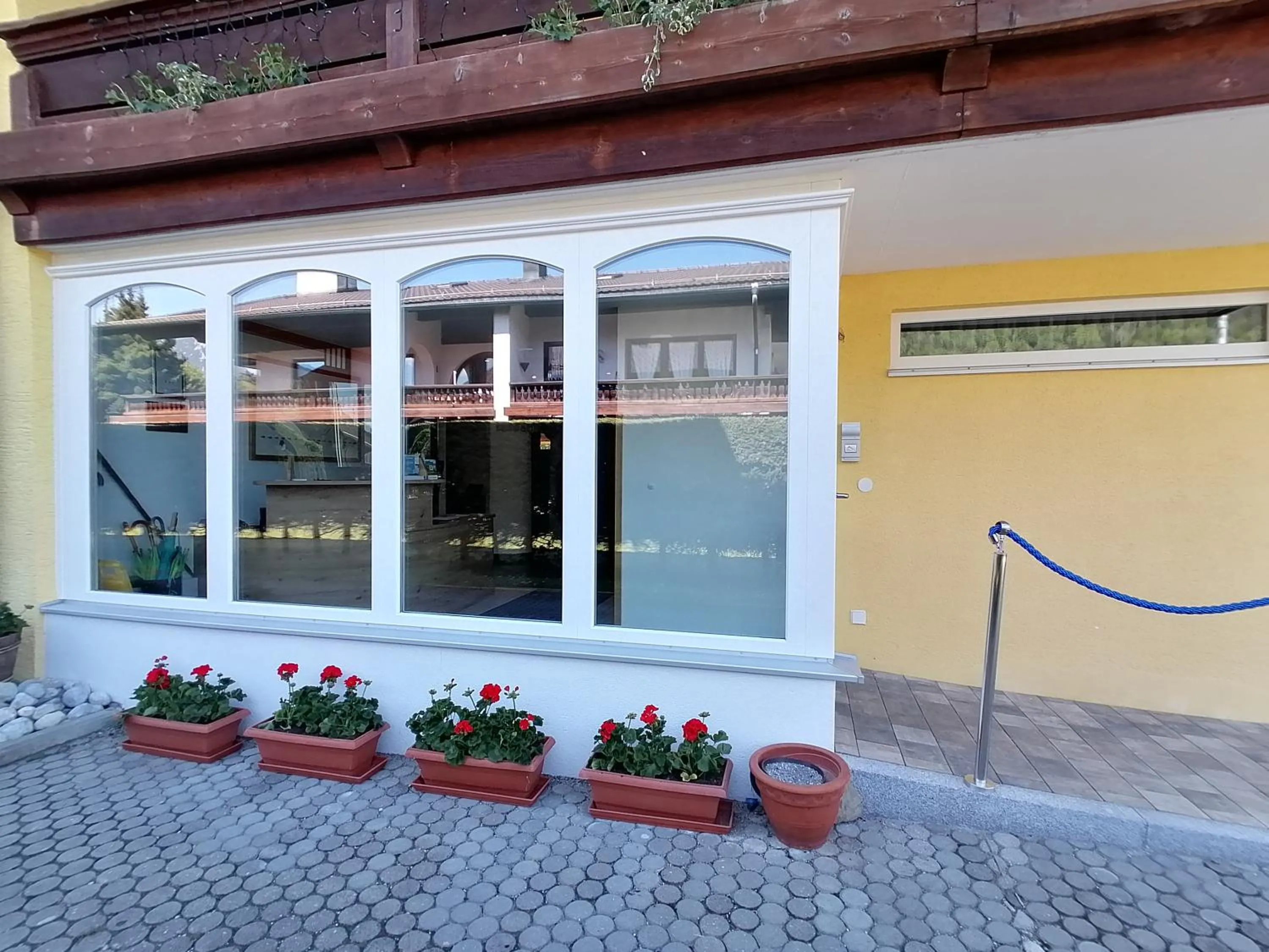 Facade/entrance in Hotel Alp Inn - Chiemgaukarte inclusive