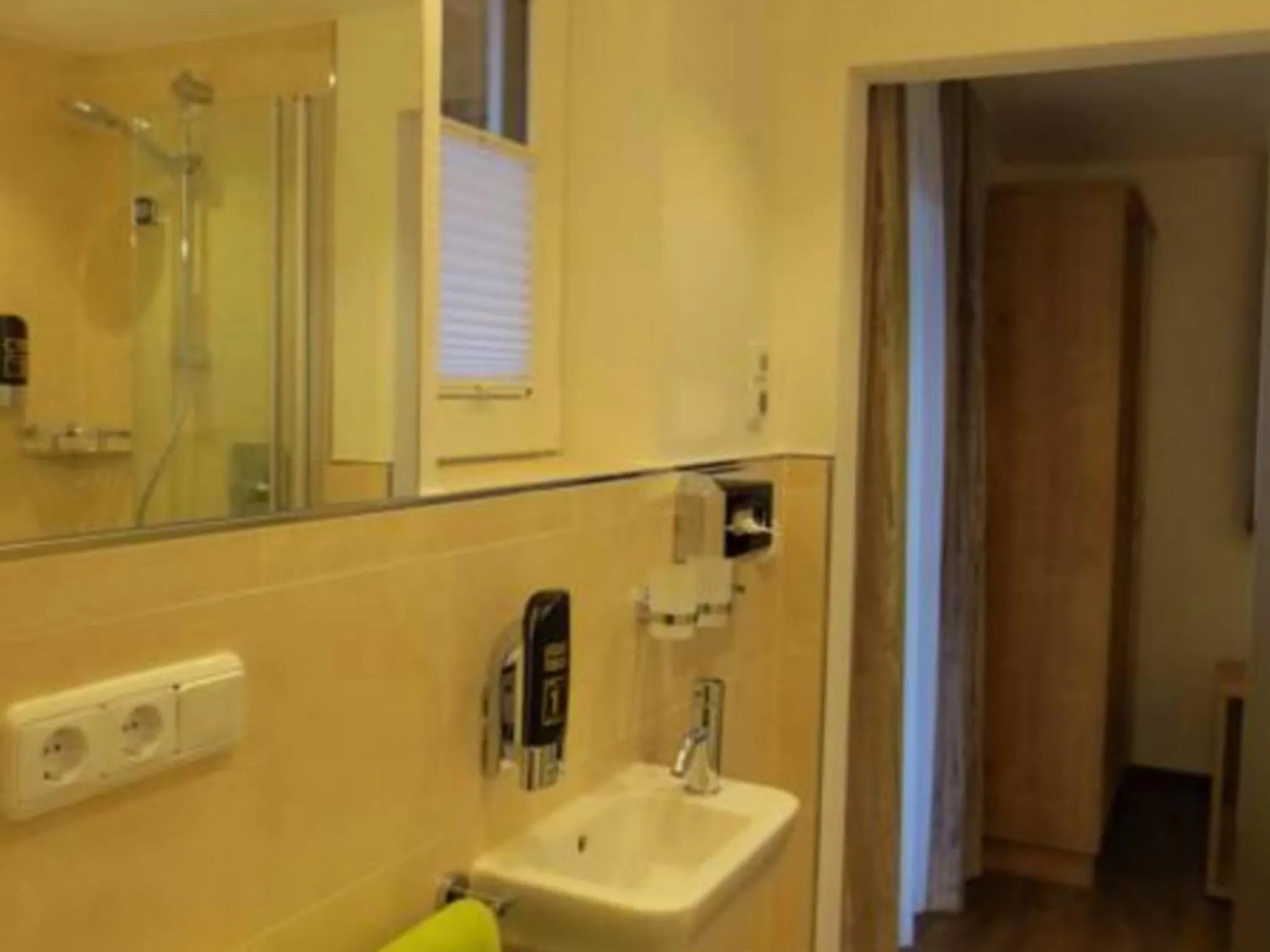 Bathroom in Hotel Alp Inn - Chiemgaukarte inclusive