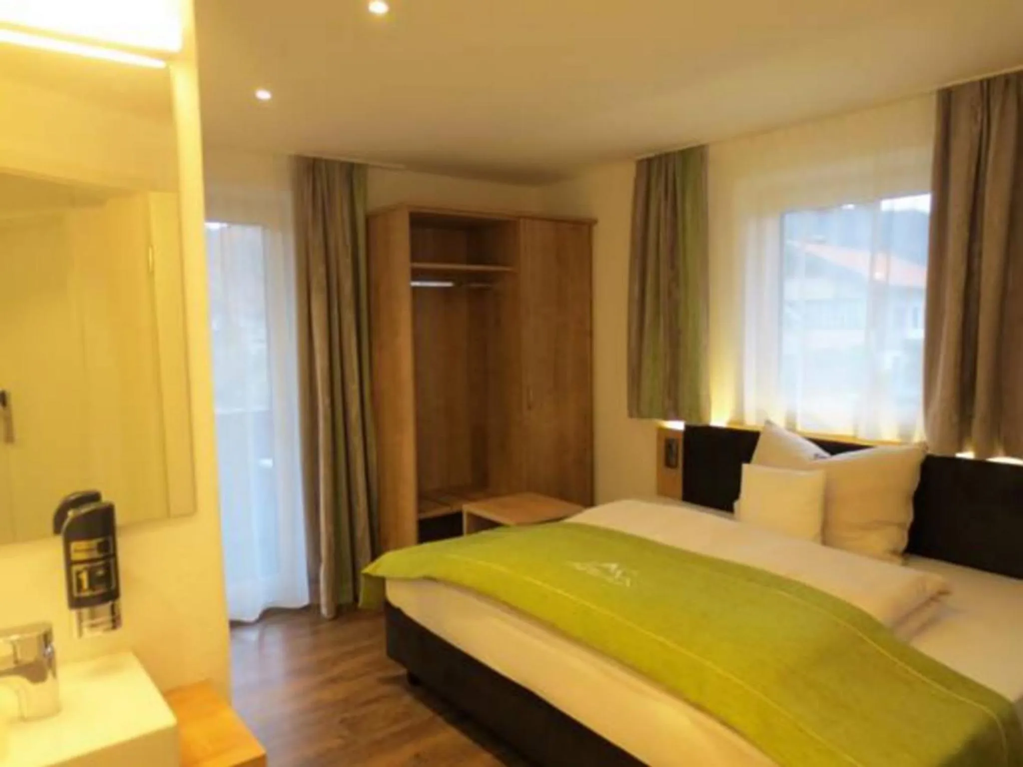 Photo of the whole room, Bed in Hotel Alp Inn - Chiemgaukarte inclusive