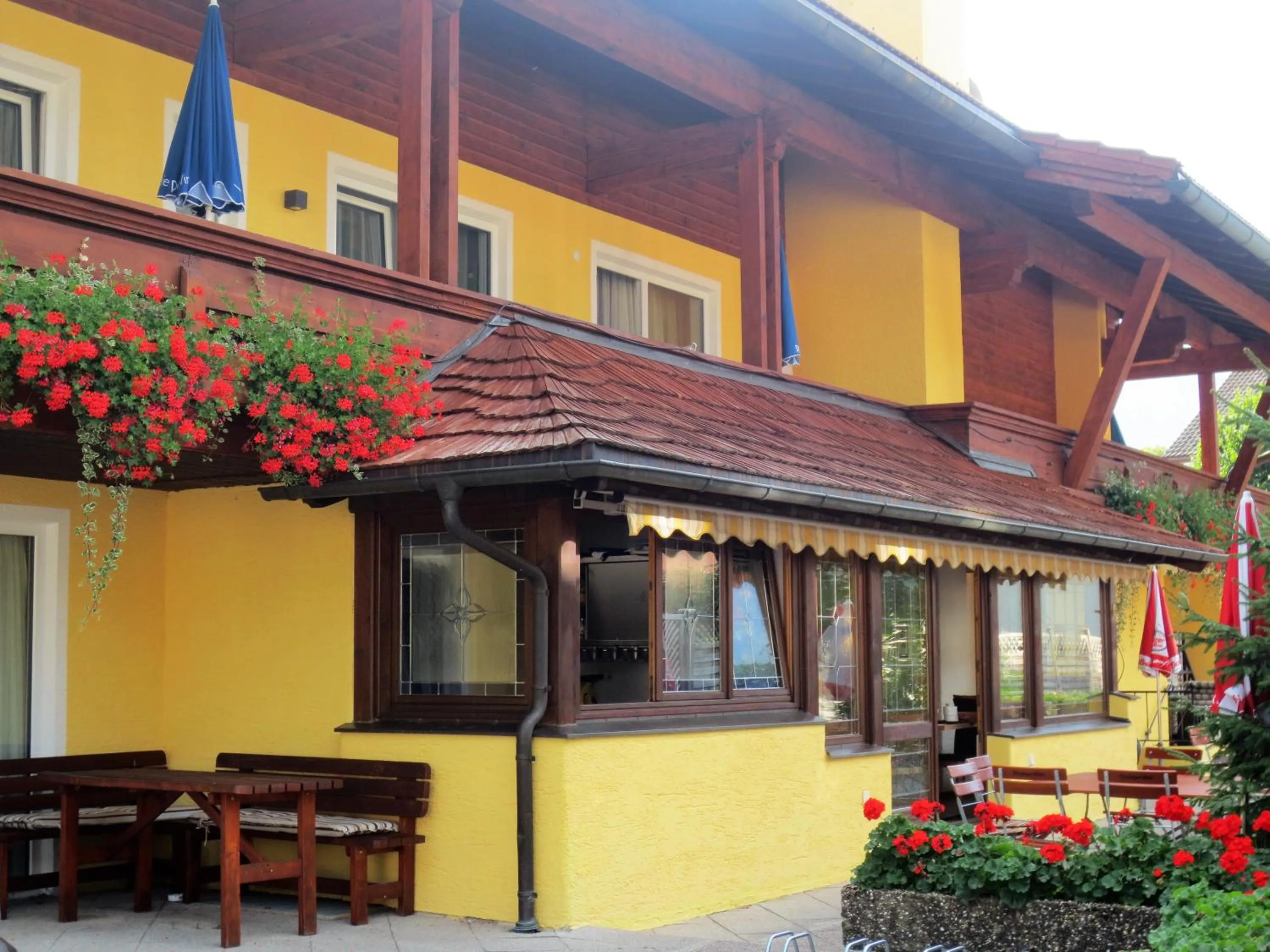 Property building in Hotel Alp Inn - Chiemgaukarte inclusive