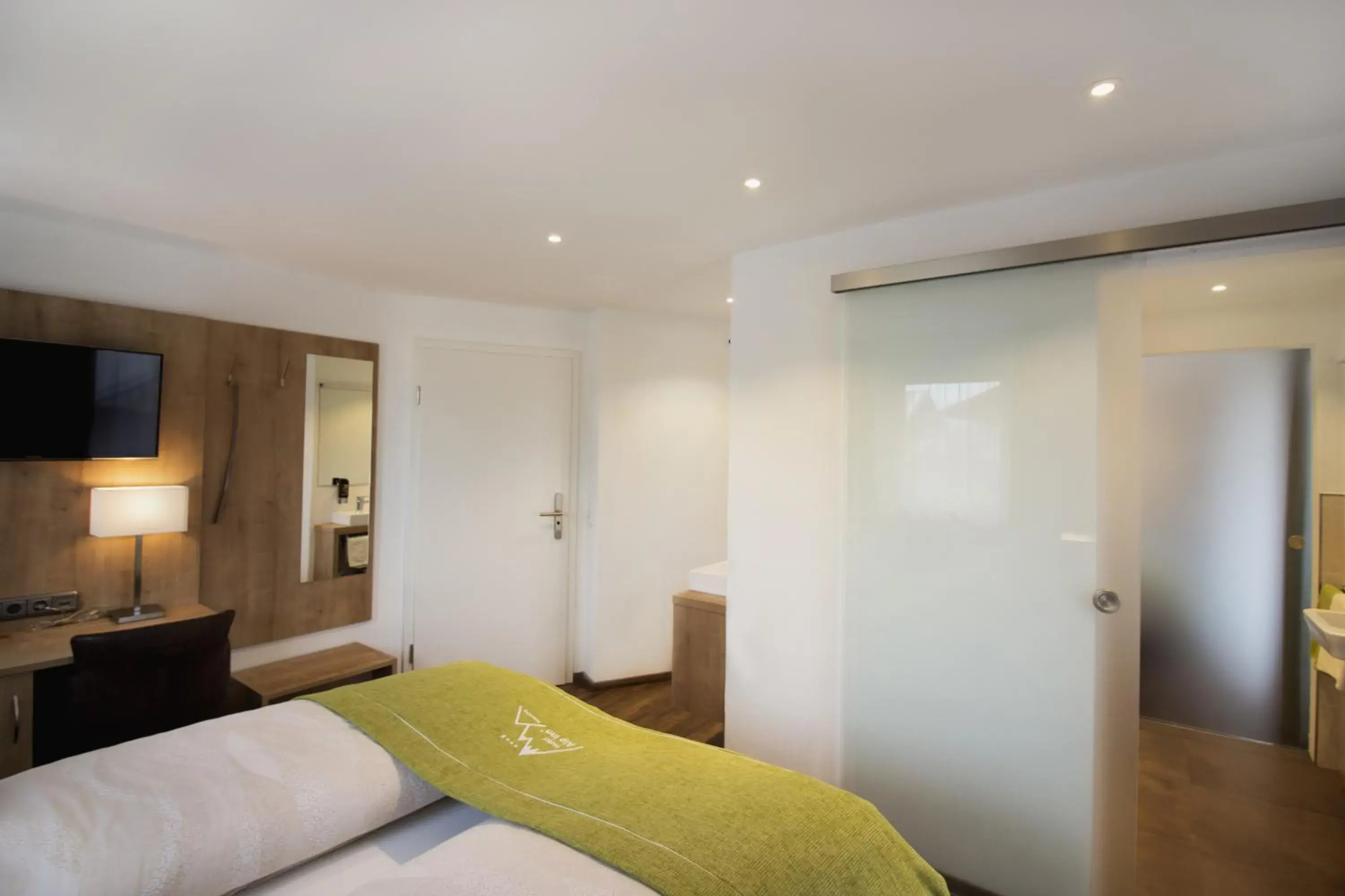 Family Room with Balcony in Hotel Alp Inn - Chiemgaukarte inclusive Family Room with Balcony in Hotel Alp Inn - Chiemgaukarte inclusive