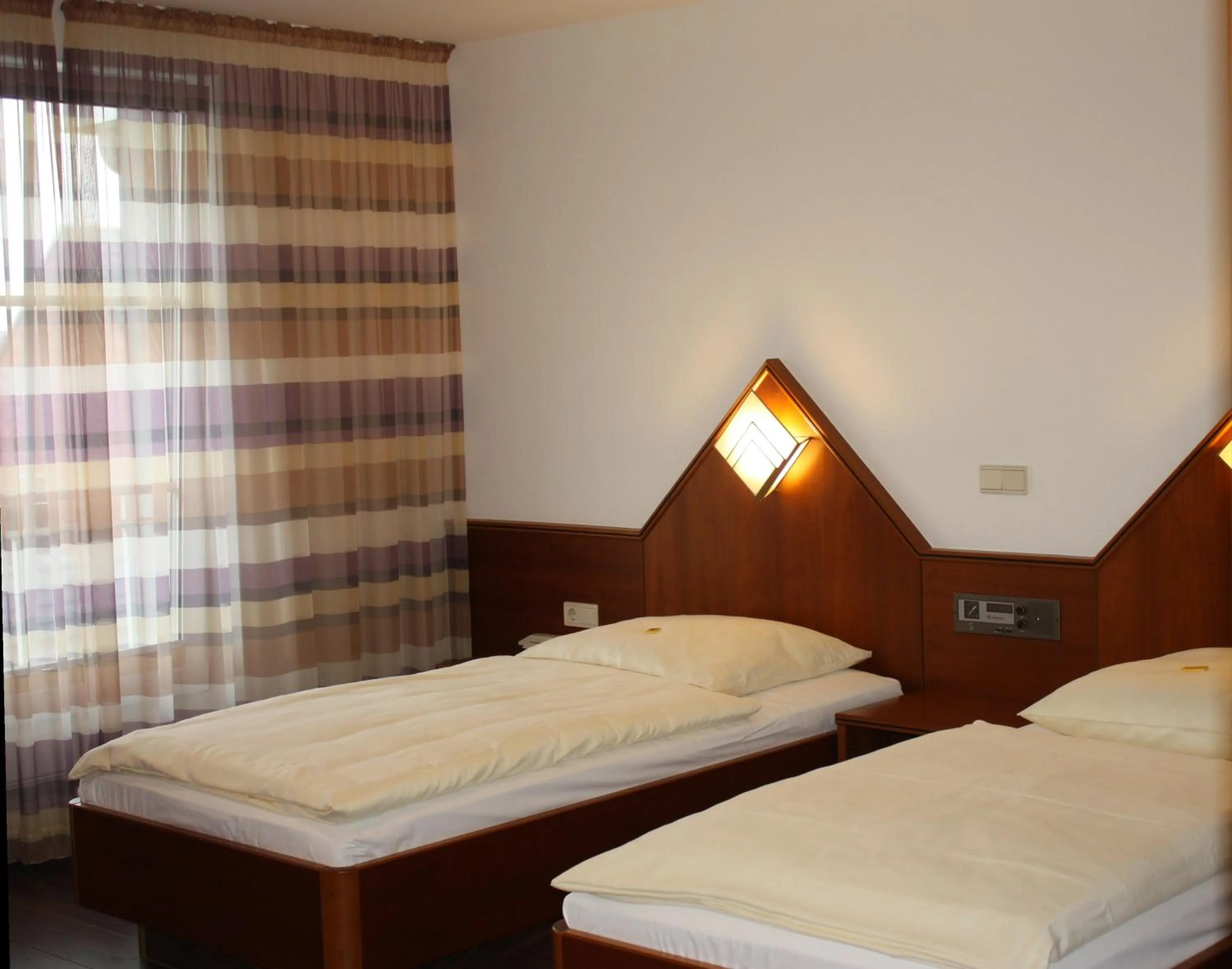 Bed in Classic Hotel Kaarst