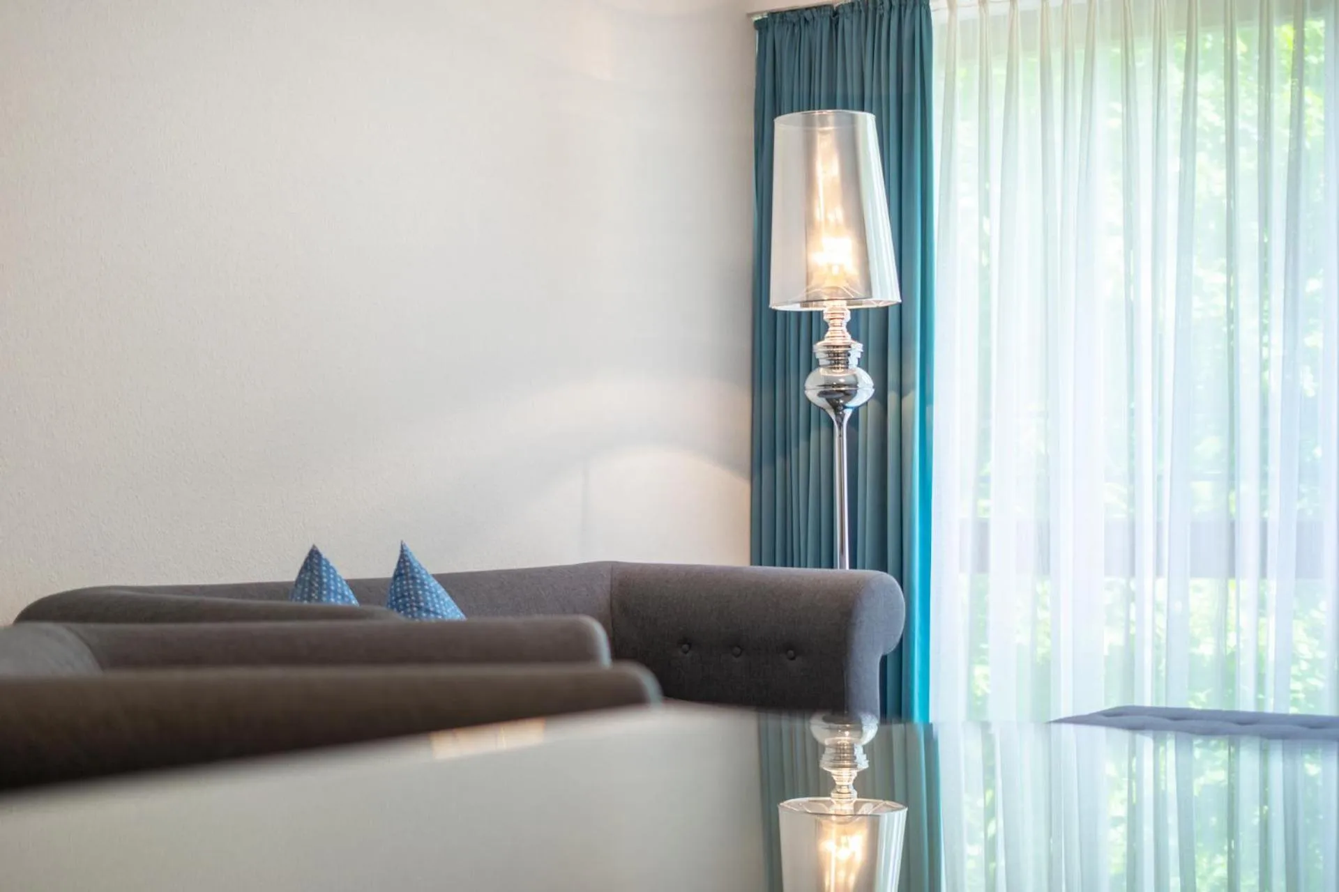 Living room in Aspire Oldenburg, Trademark Collection by Wyndham