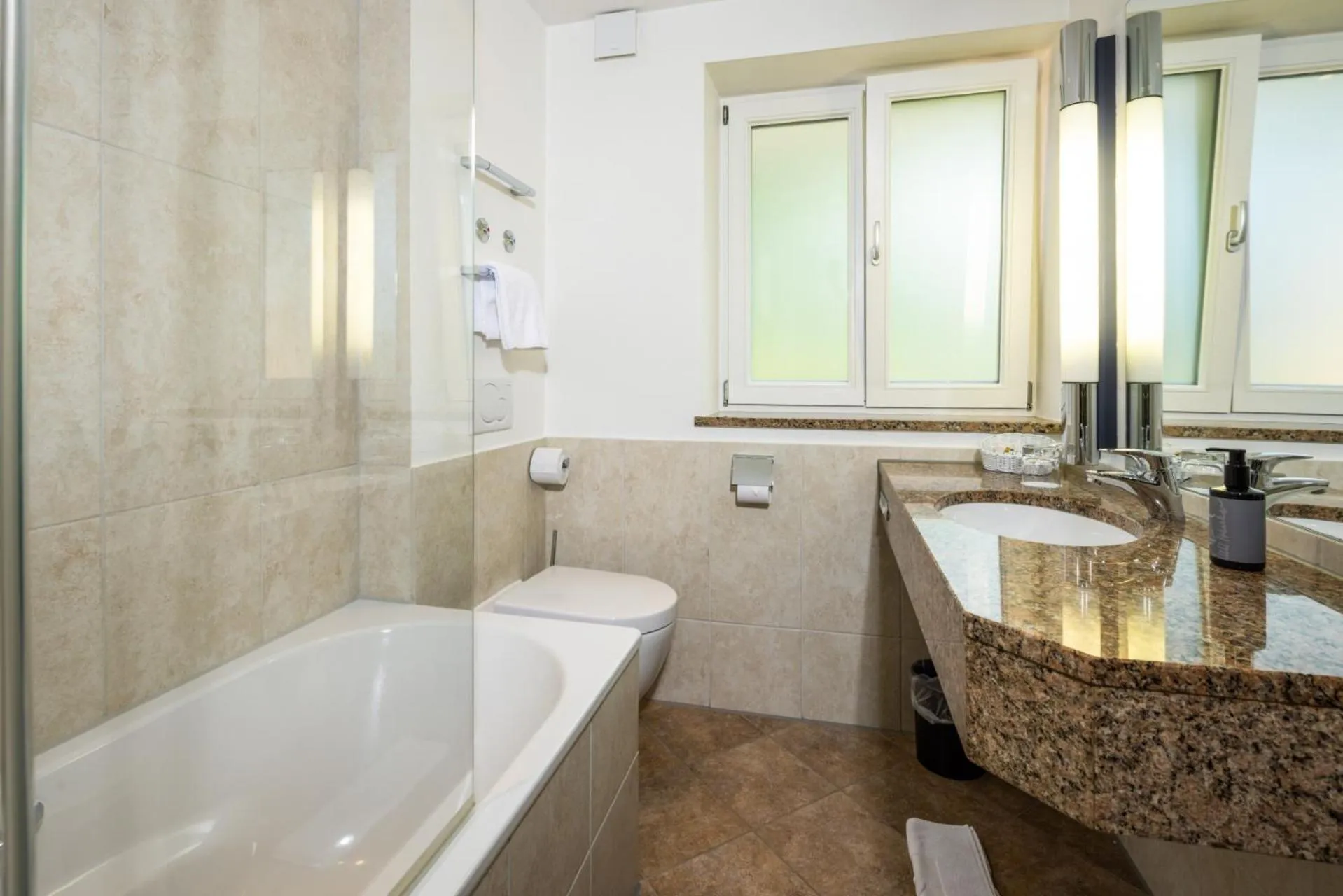 Bathroom in Alm- & Wellnesshotel Alpenhof