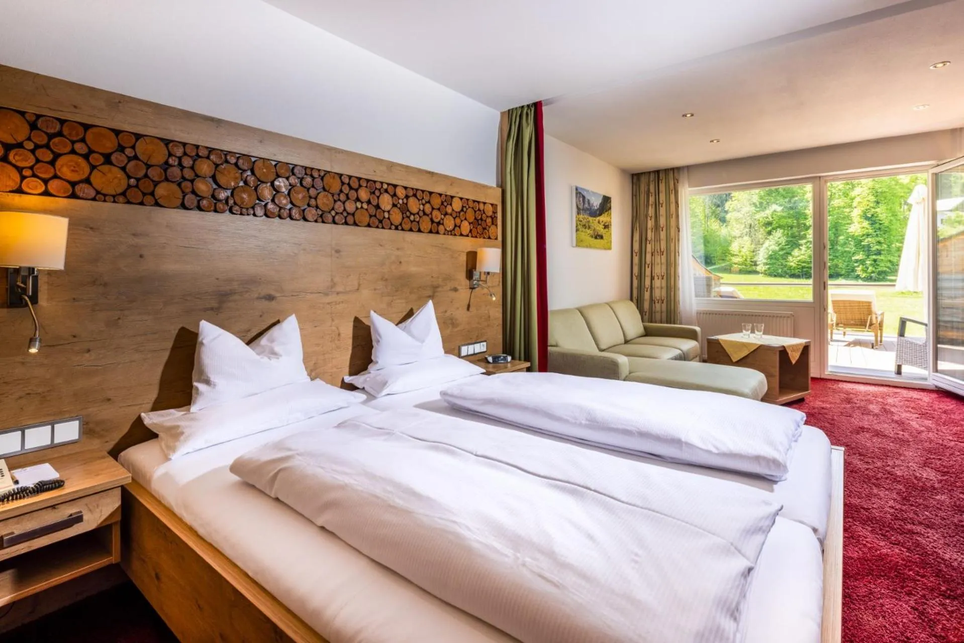 Photo of the whole room, Bed in Alm- & Wellnesshotel Alpenhof