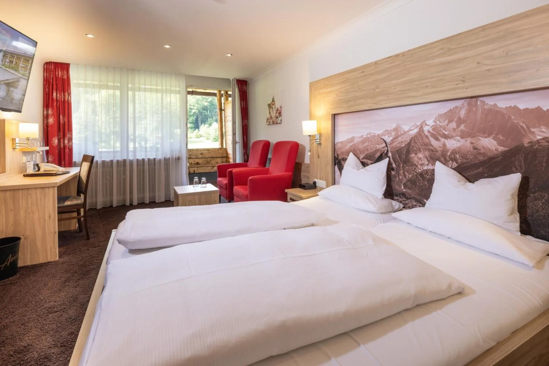 Photo of the whole room, Bed in Alm- & Wellnesshotel Alpenhof