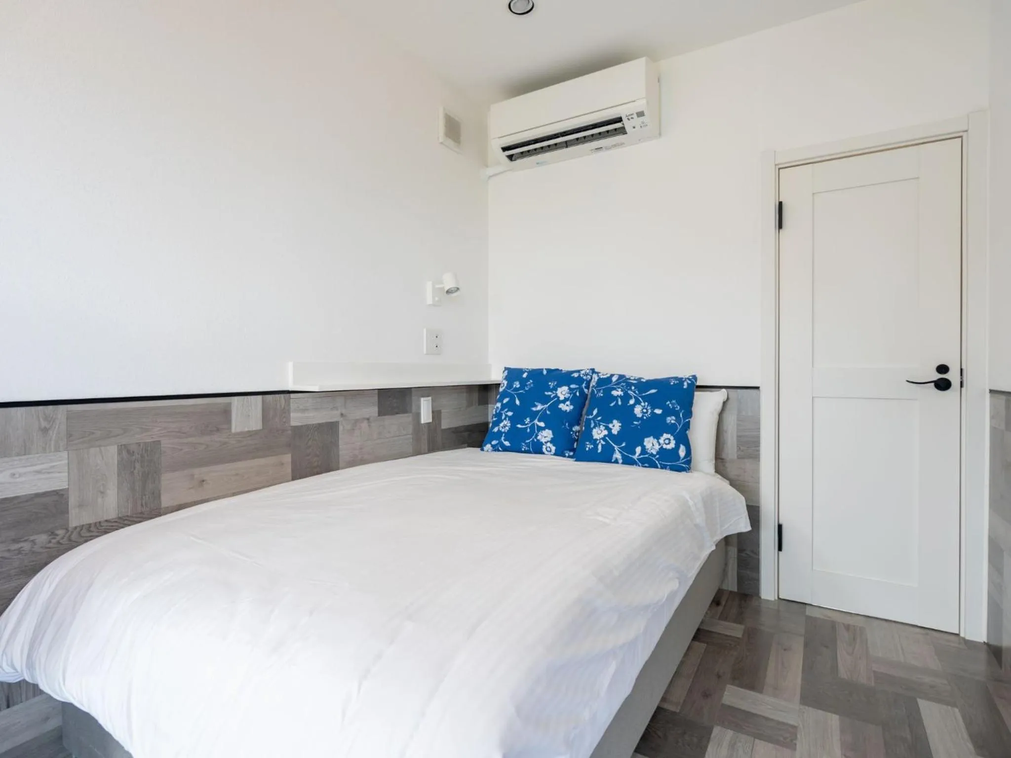 Bed in GLORY ISLAND OKINAWA Yabusachi Resort