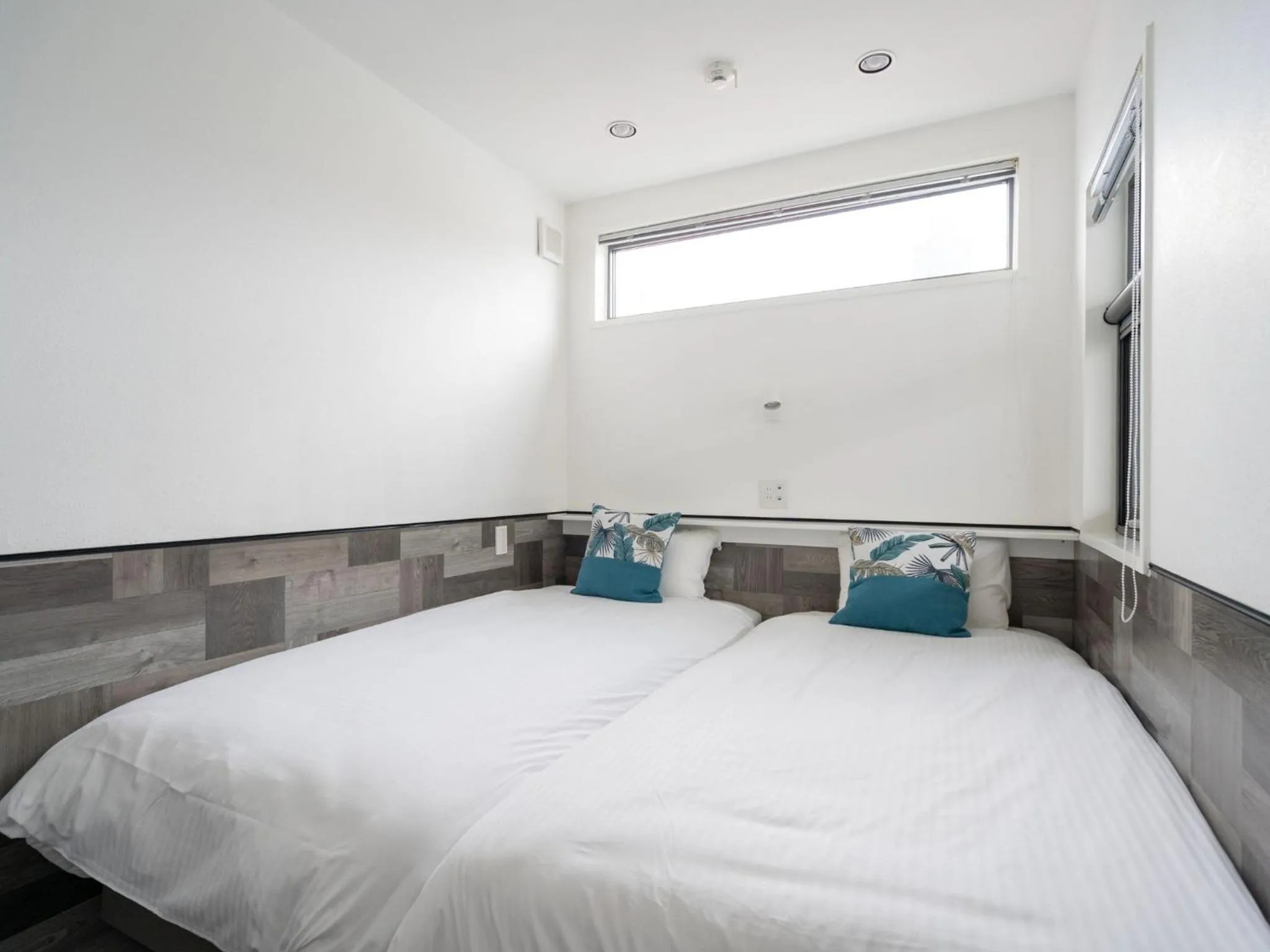 Bed in GLORY ISLAND OKINAWA Yabusachi Resort