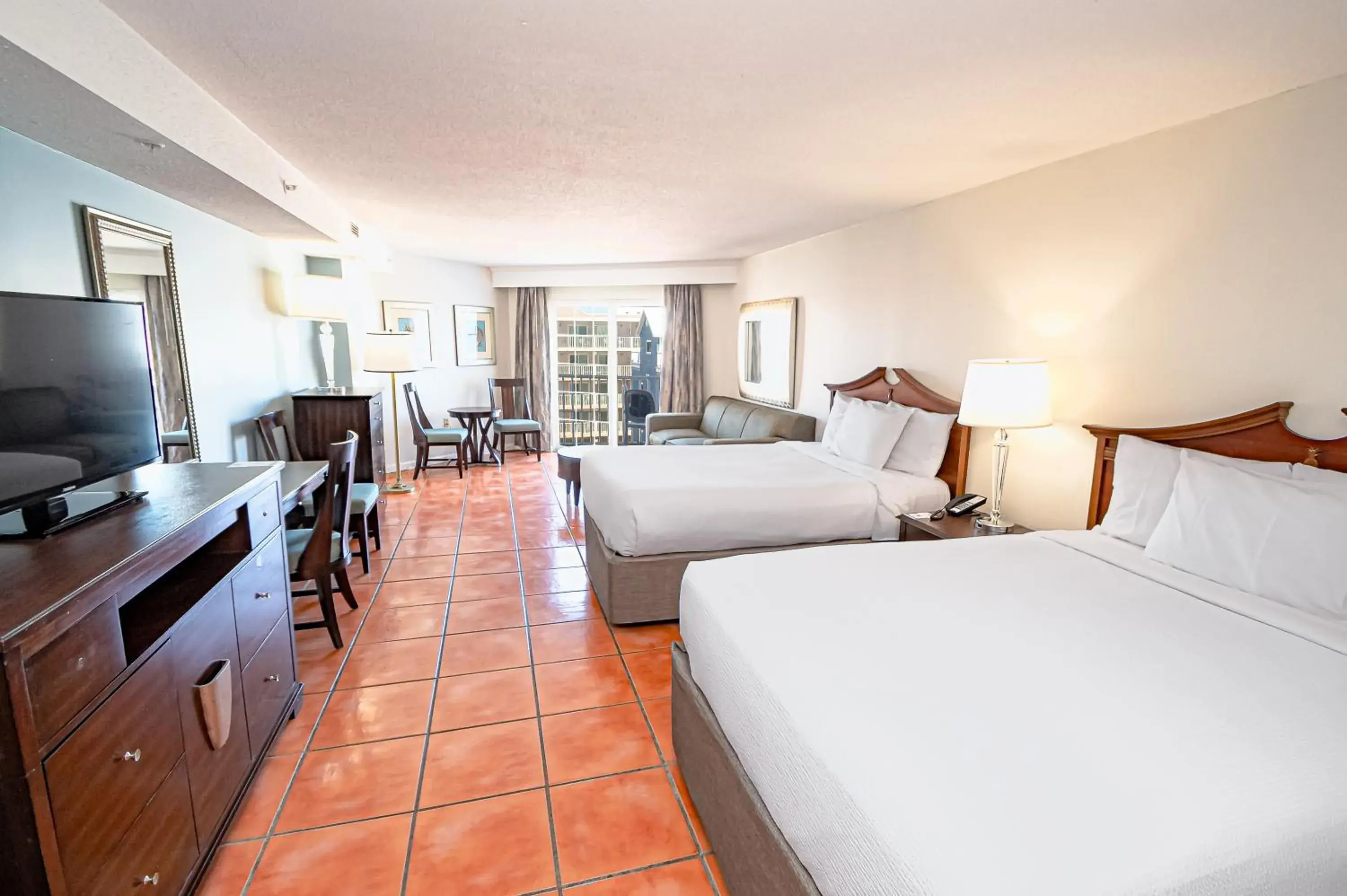 2 Queen Beds with Sofa Bed, Disability Access with Kitchenette Ocean View Efficiency in Tidelands Caribbean Boardwalk Hotel and Suites 2 Queen Beds with Sofa Bed, Disability Access with Kitchenette Ocean View Efficiency in Tidelands Caribbean Boardwalk Hotel and Suites