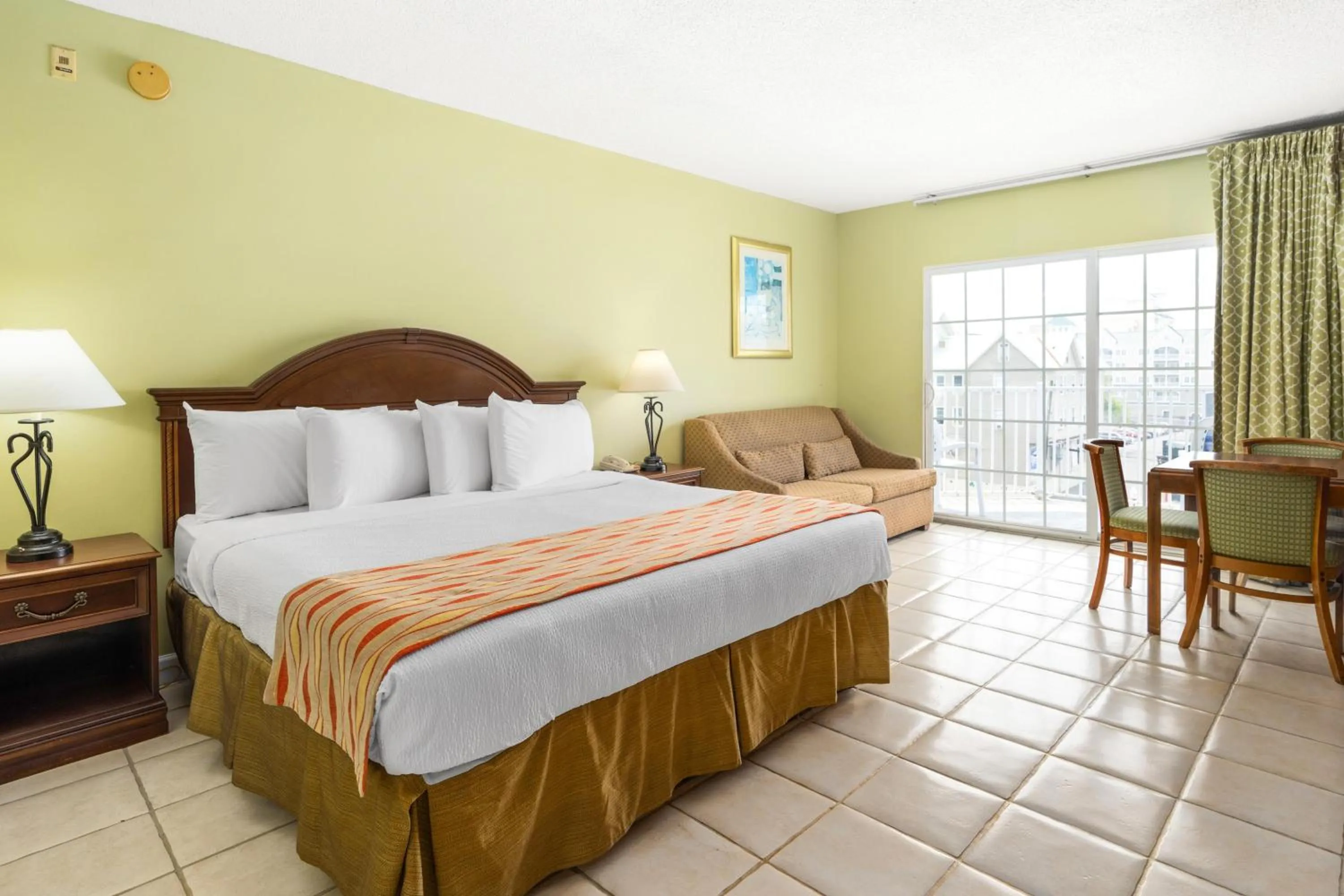Bedroom, Bed in Tidelands Caribbean Boardwalk Hotel and Suites