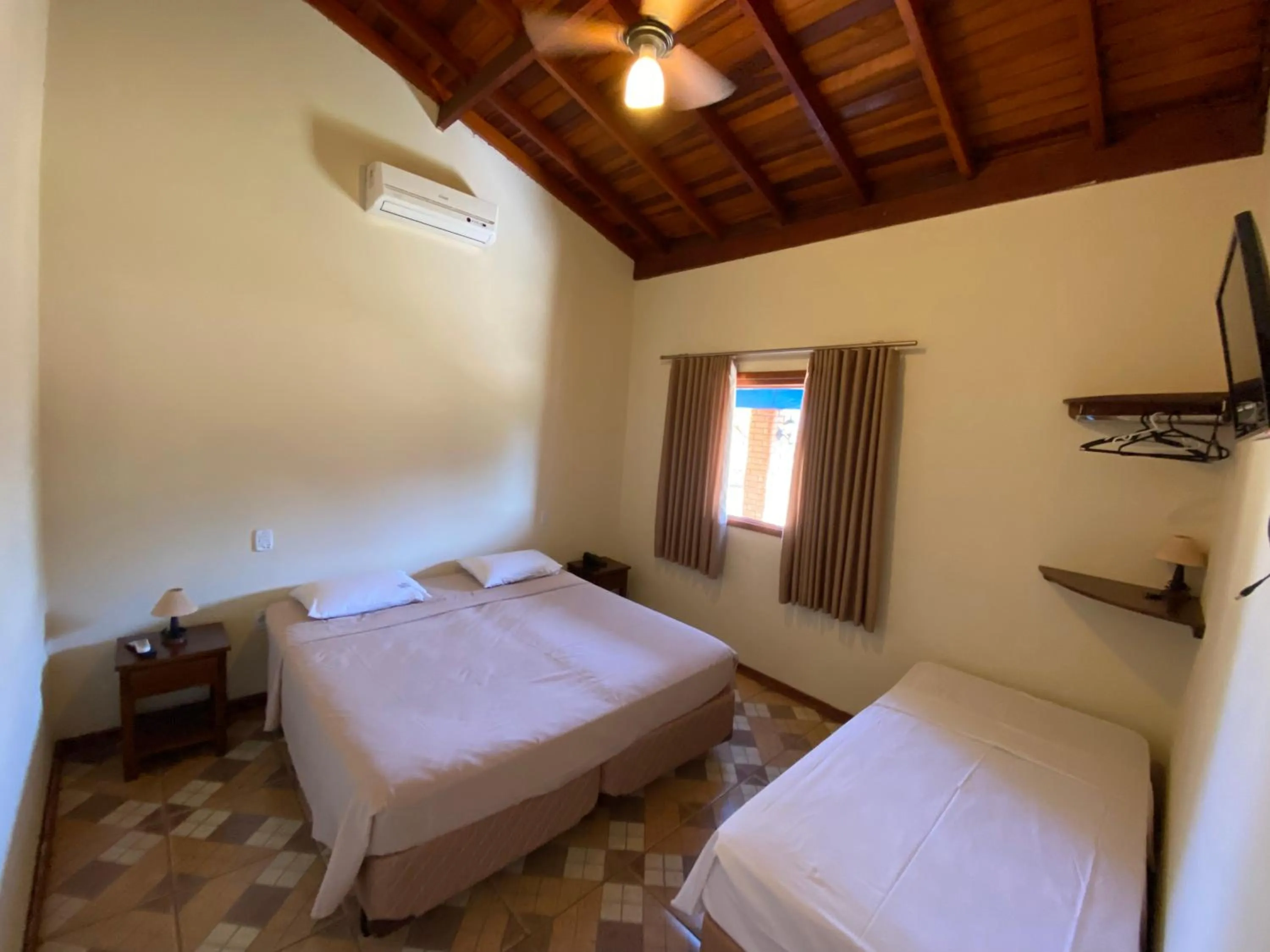 Bed in Mirante Praia Hotel