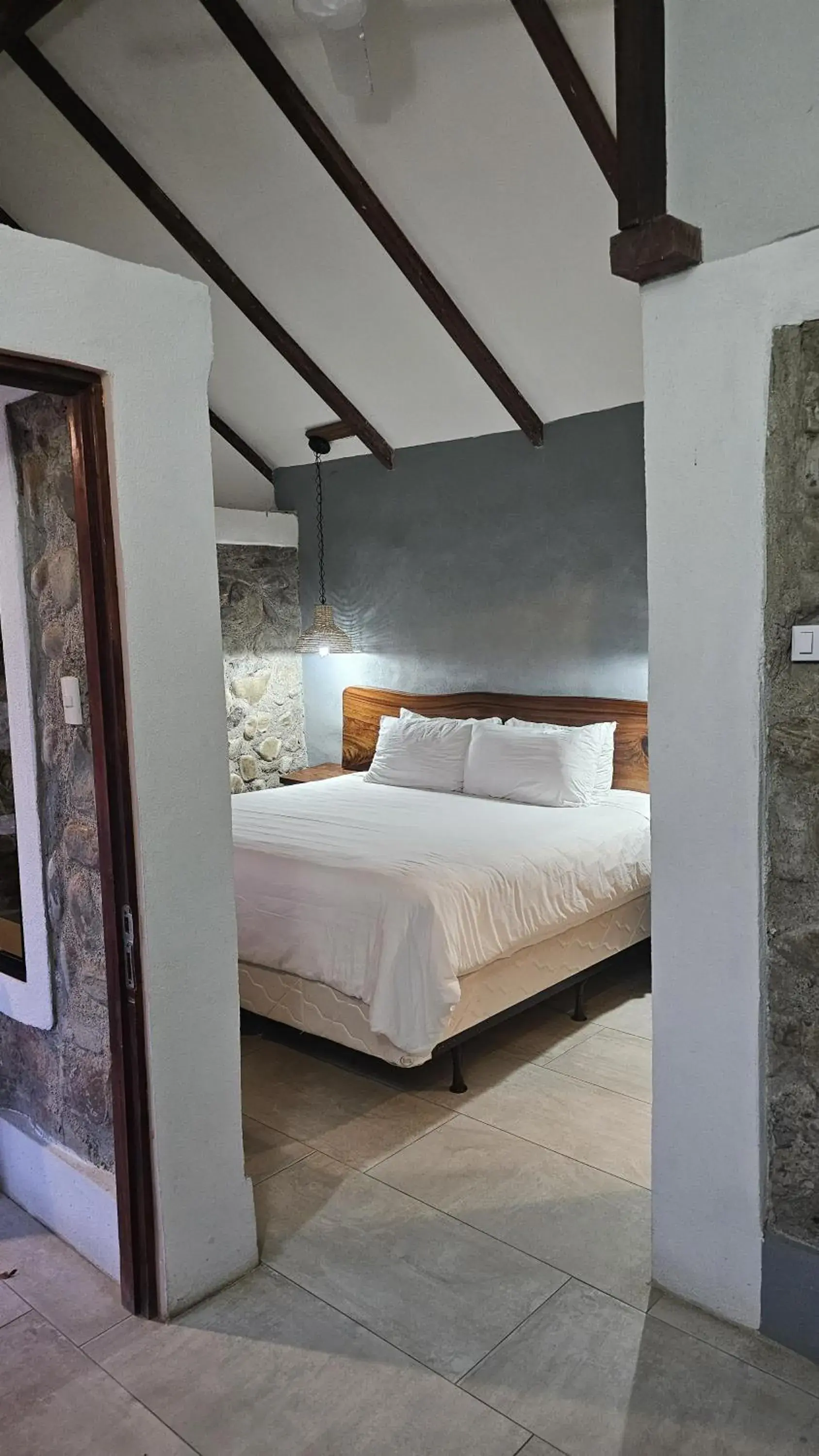 One bedroom villa with 1 king bed (on the mountain crossing the main street) in Karahe Beach Hotel One bedroom villa with 1 king bed (on the mountain crossing the main street) in Karahe Beach Hotel