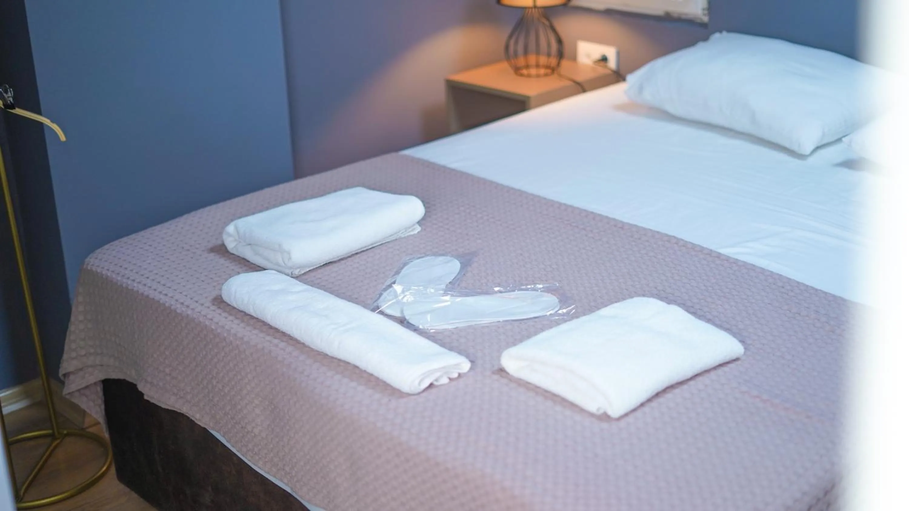 Bed in Luka Suit Hotel