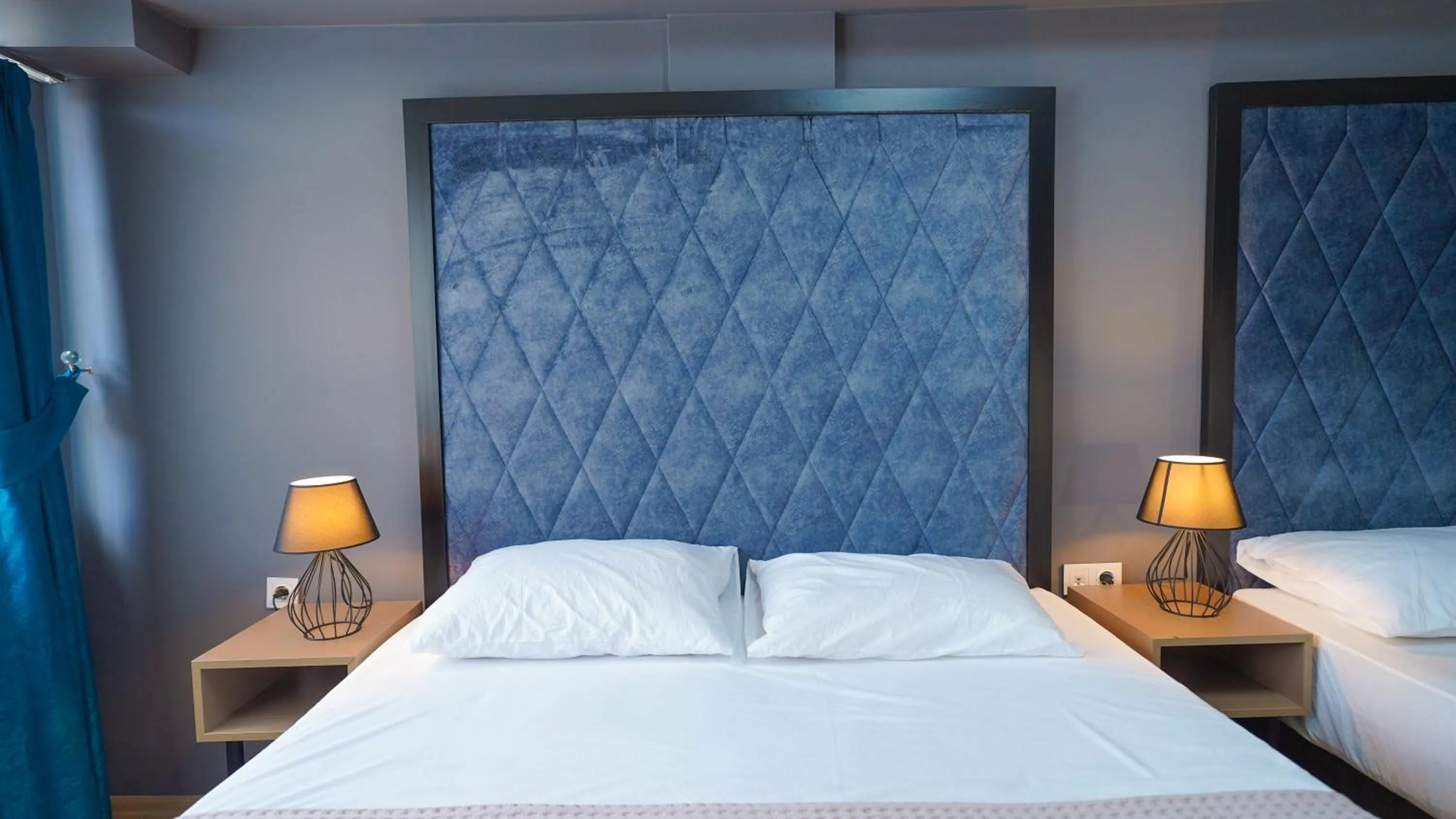 Bed in Luka Suit Hotel