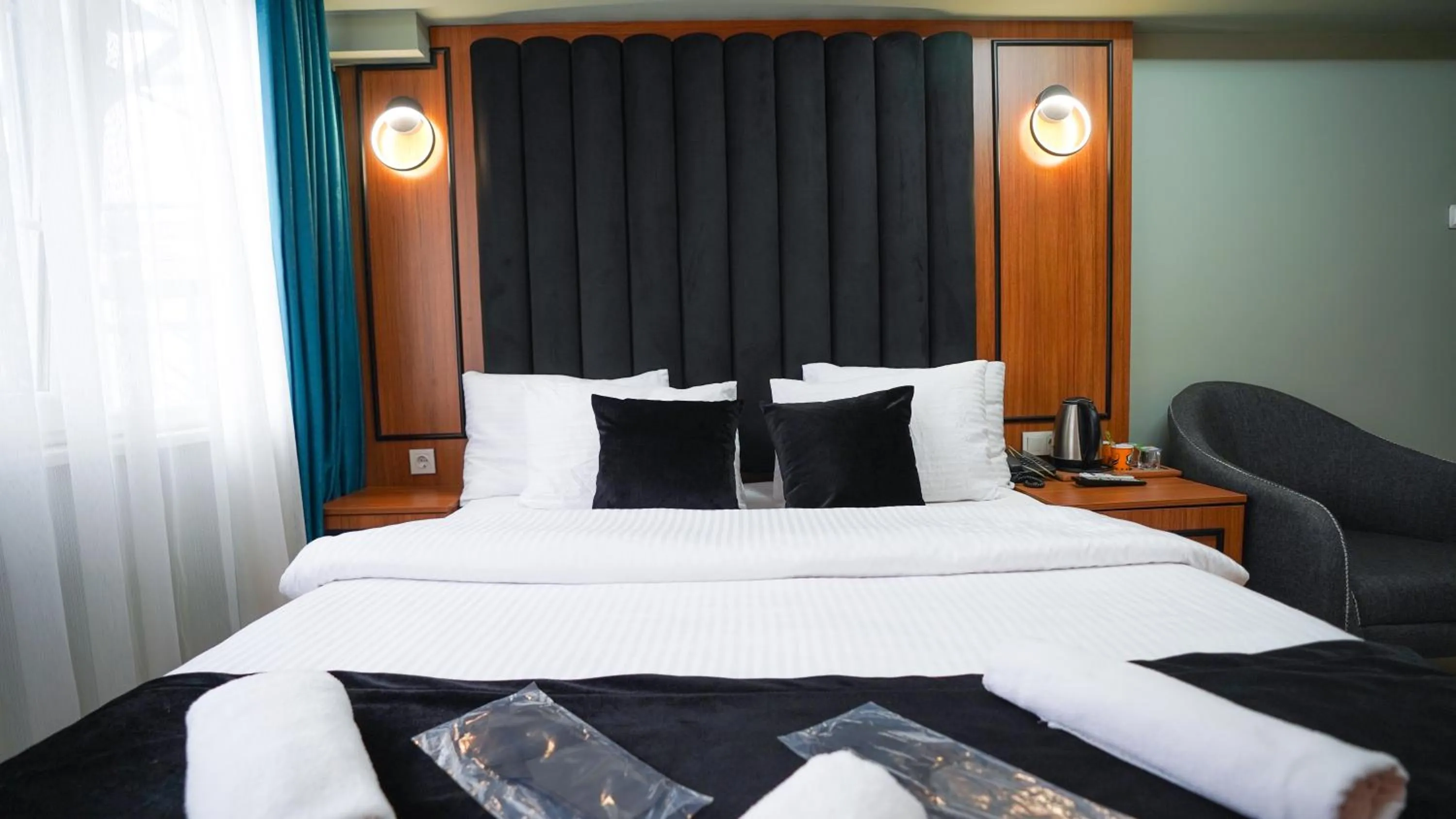 Bed in Luka Suit Hotel