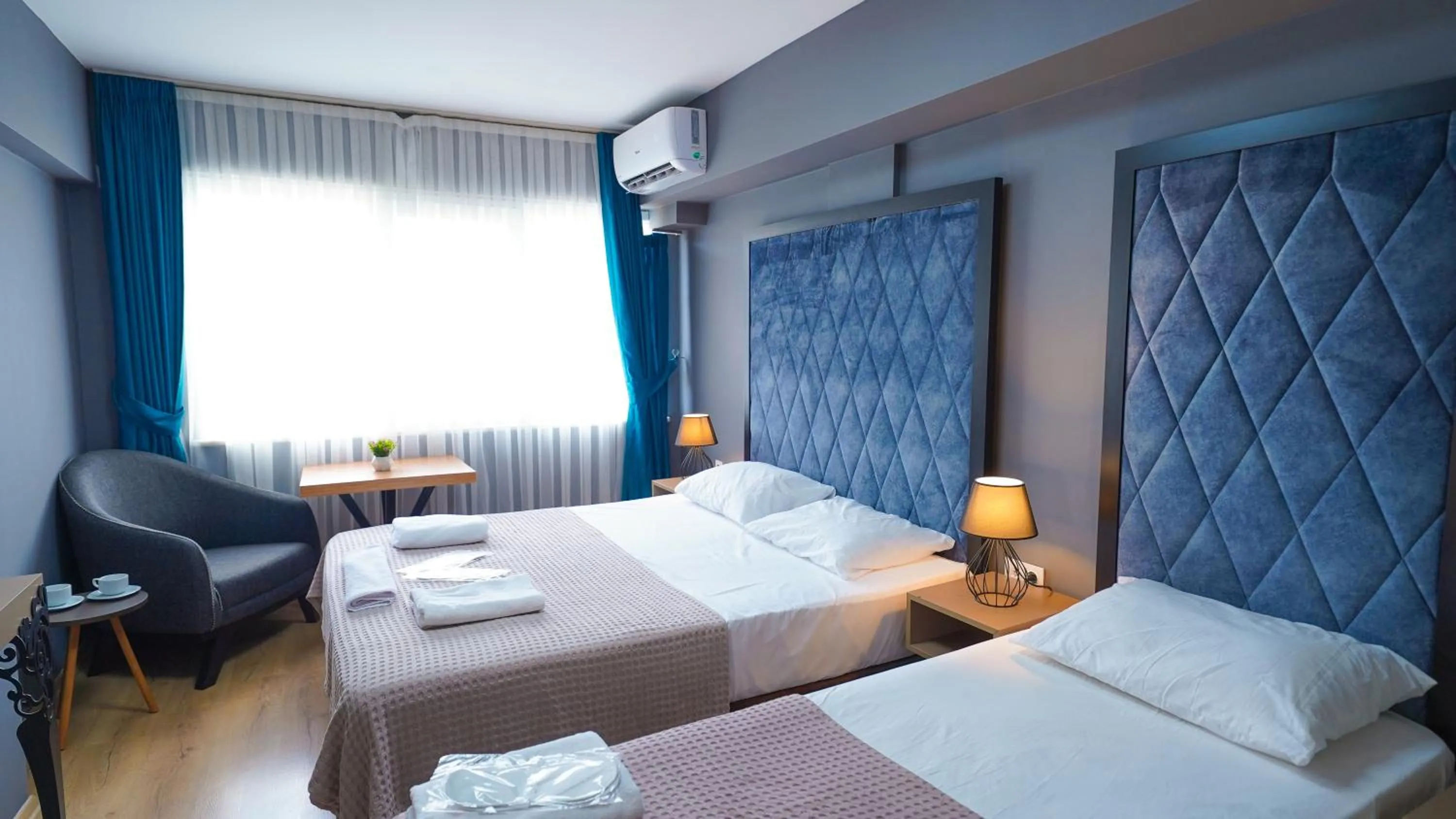 Bed in Luka Suit Hotel