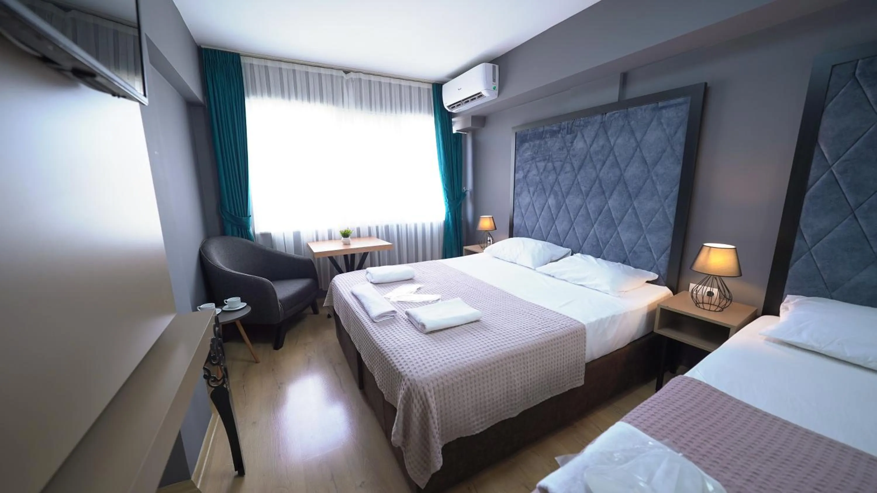 Bed in Luka Suit Hotel