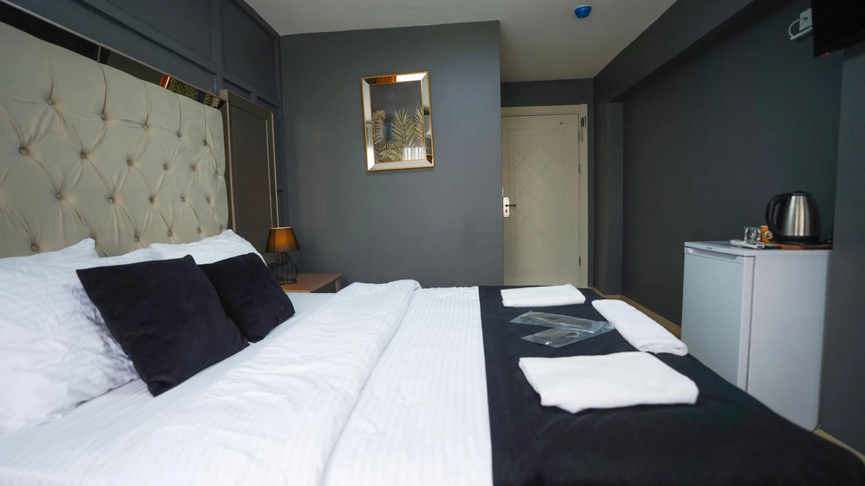 Bed in Luka Suit Hotel