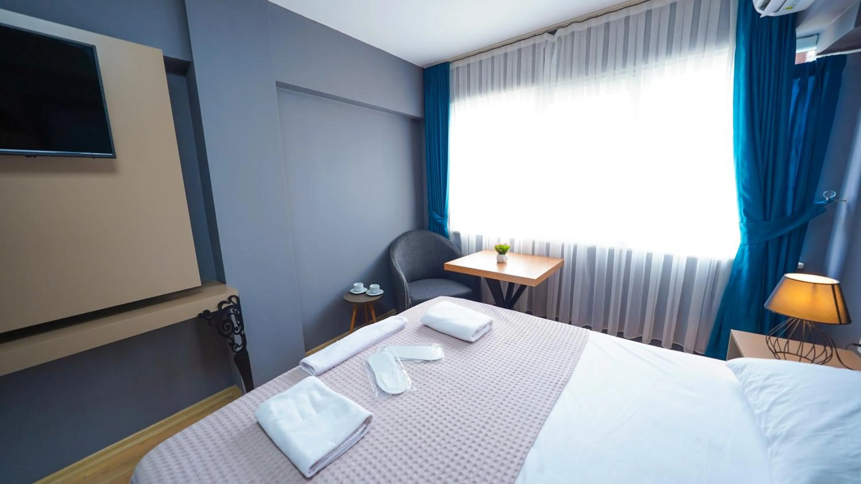 Bed in Luka Suit Hotel