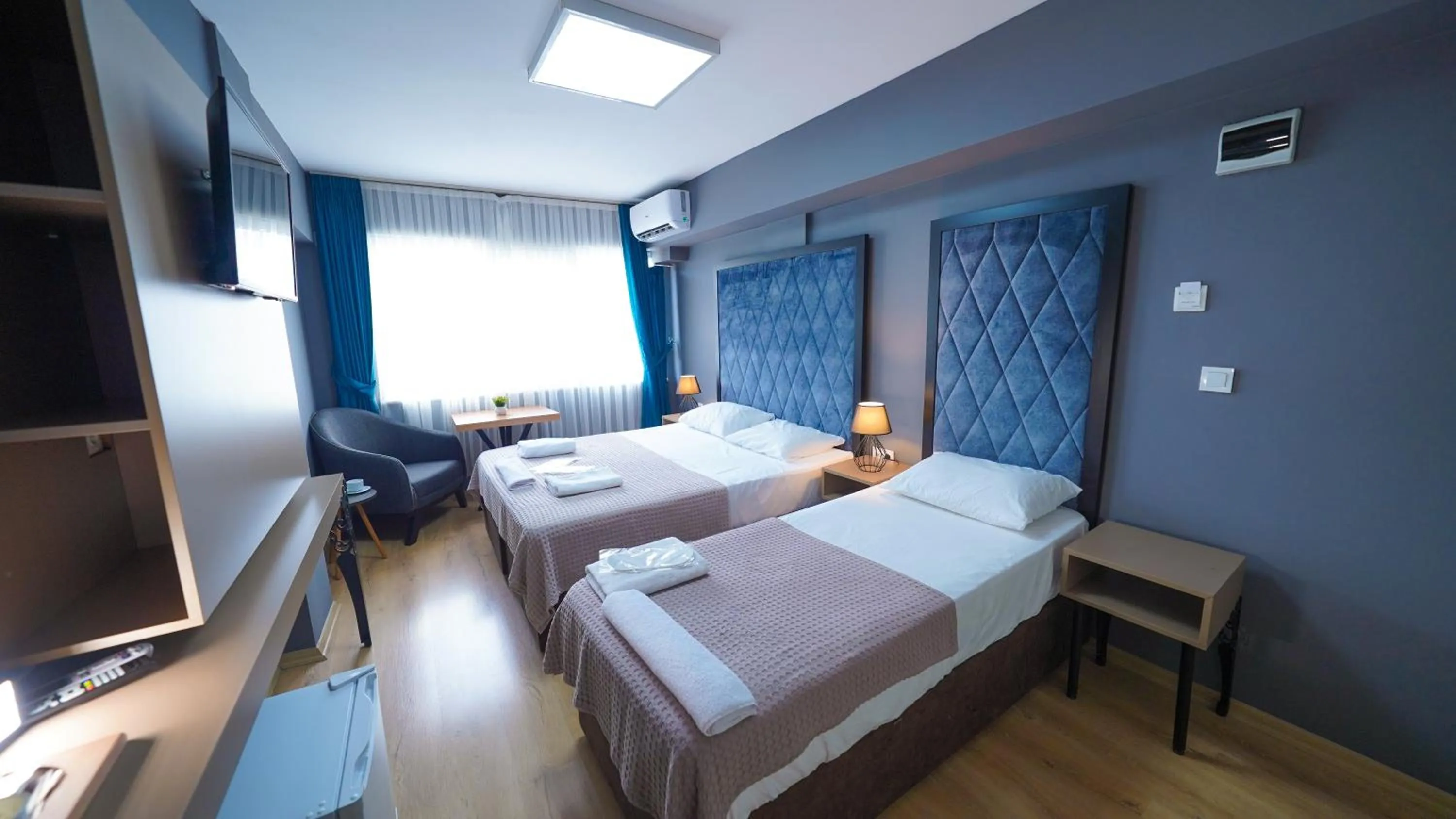 Bed in Luka Suit Hotel