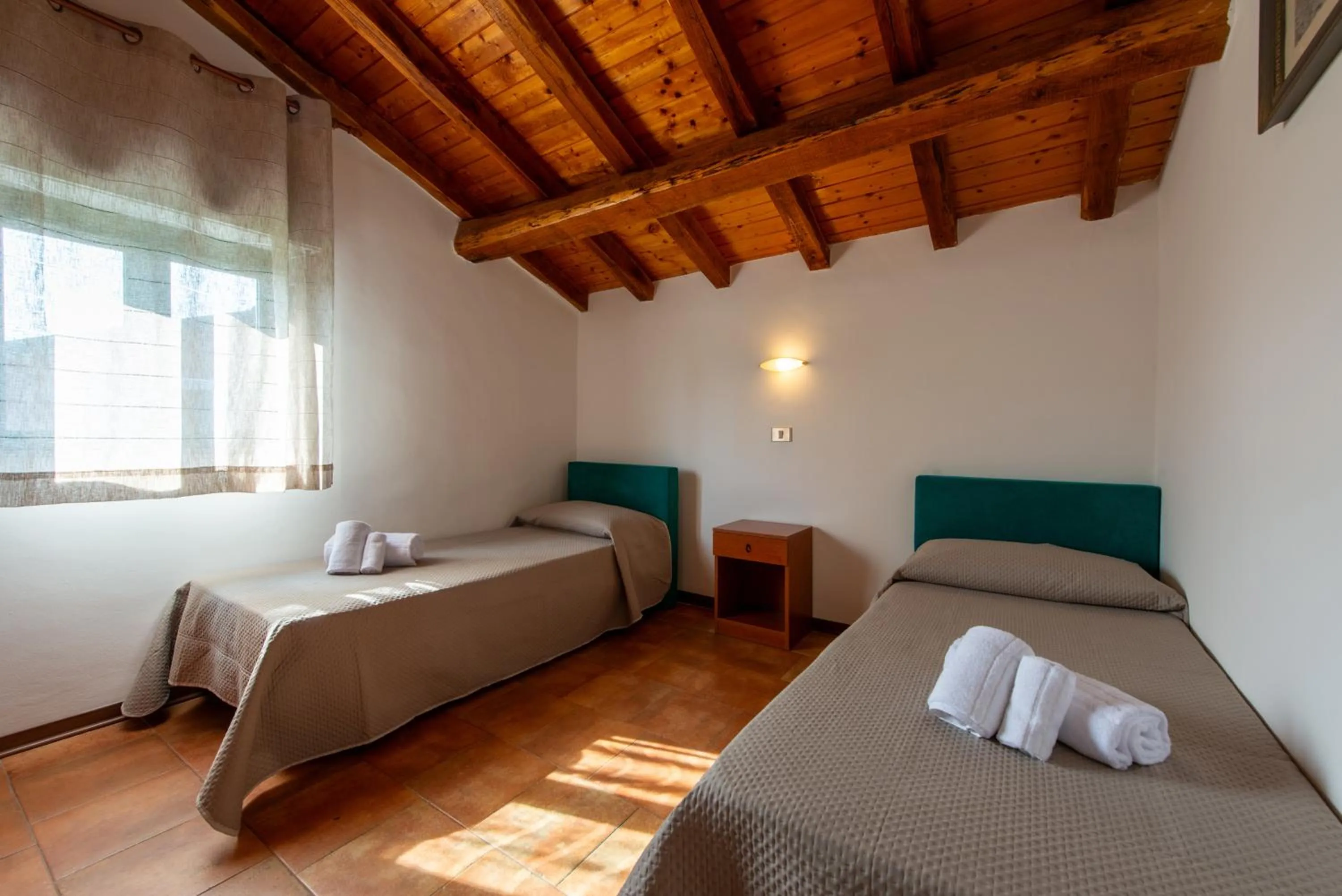 Bed in Villaggio Alkantara