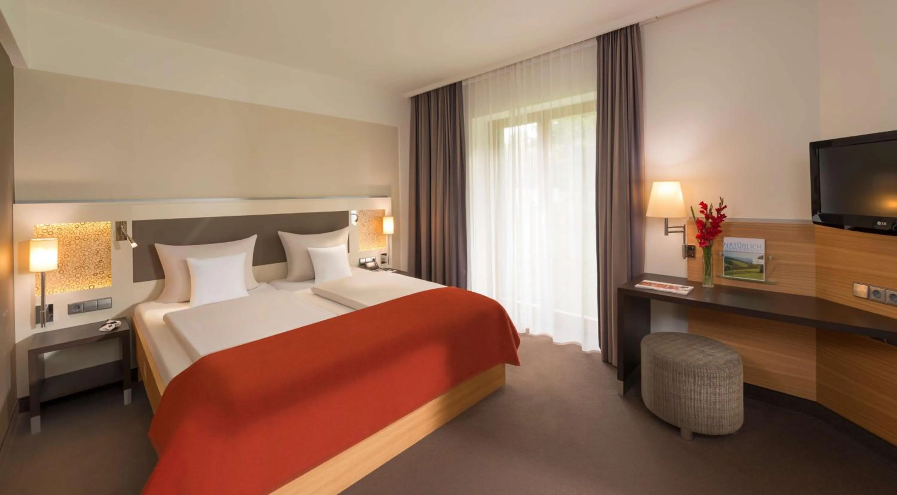 Photo of the whole room, Bed in Dorint Thermenhotel Freiburg