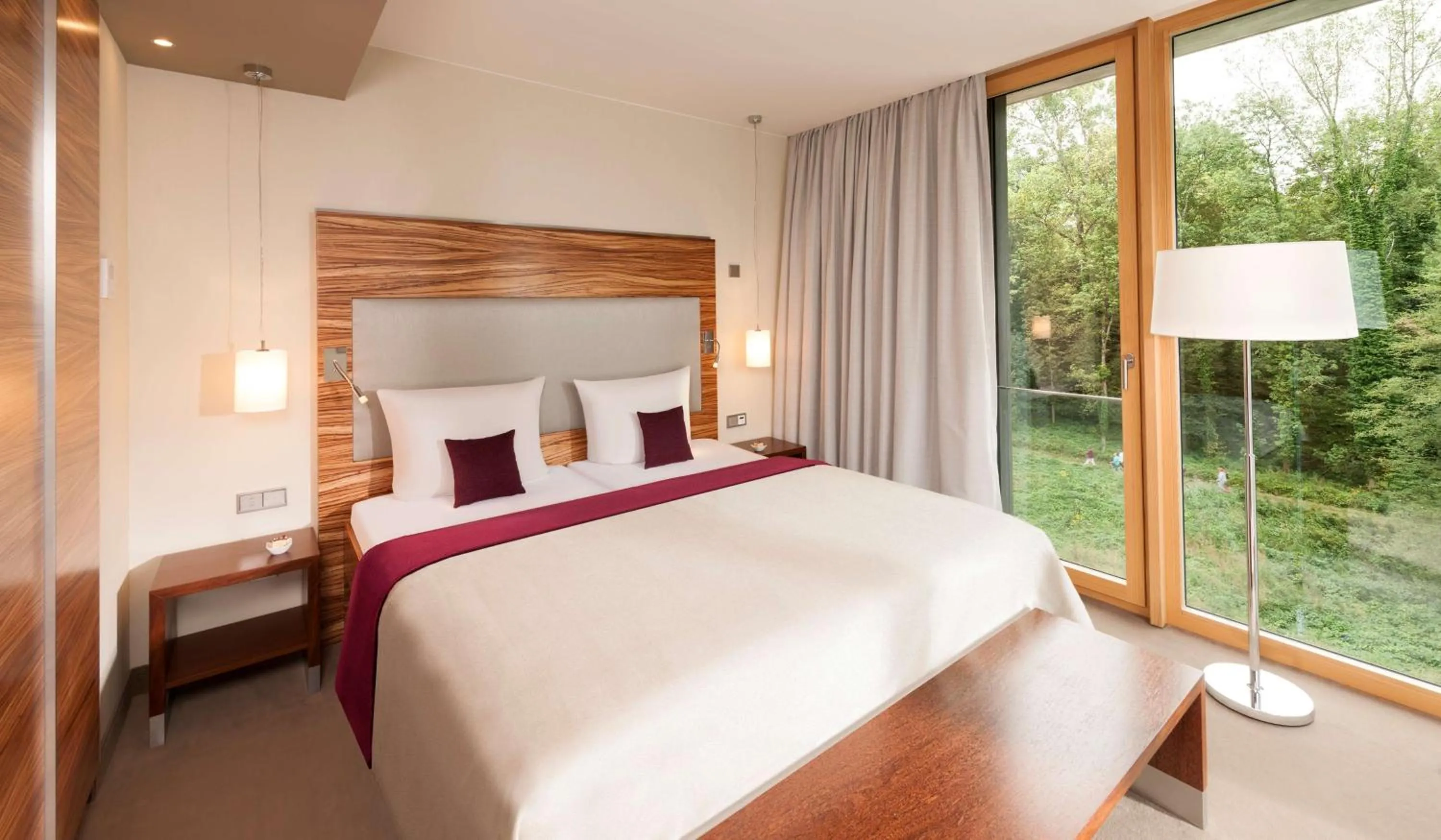 Photo of the whole room, Bed in Dorint Thermenhotel Freiburg