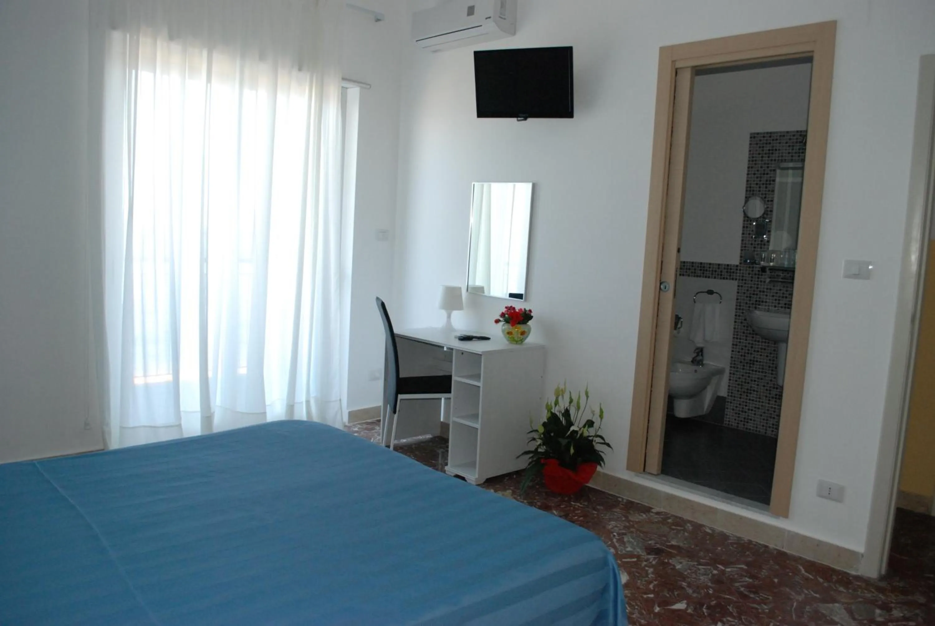 Bed in Maniel Beach Hotel