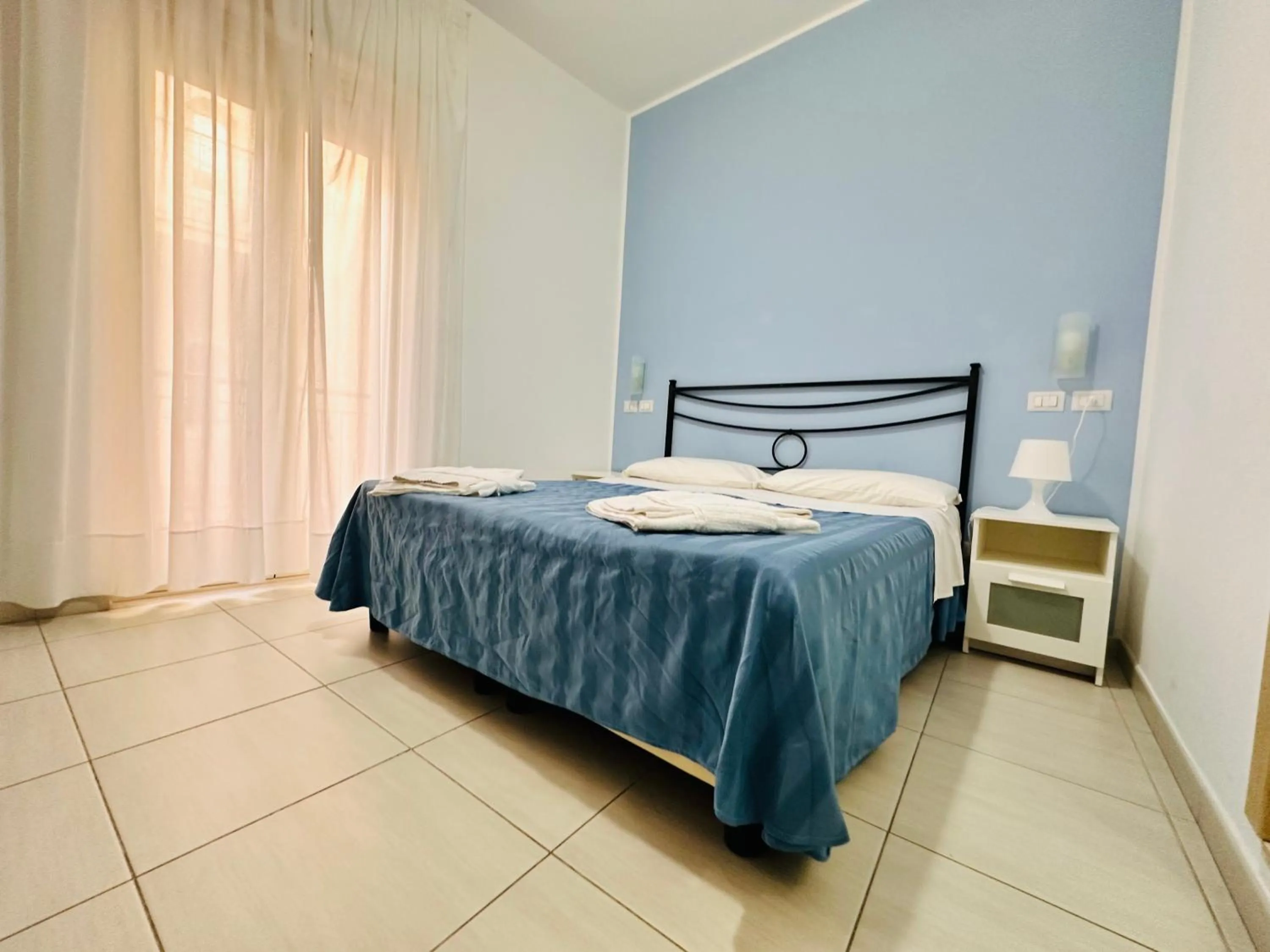 Bed in Maniel Beach Hotel