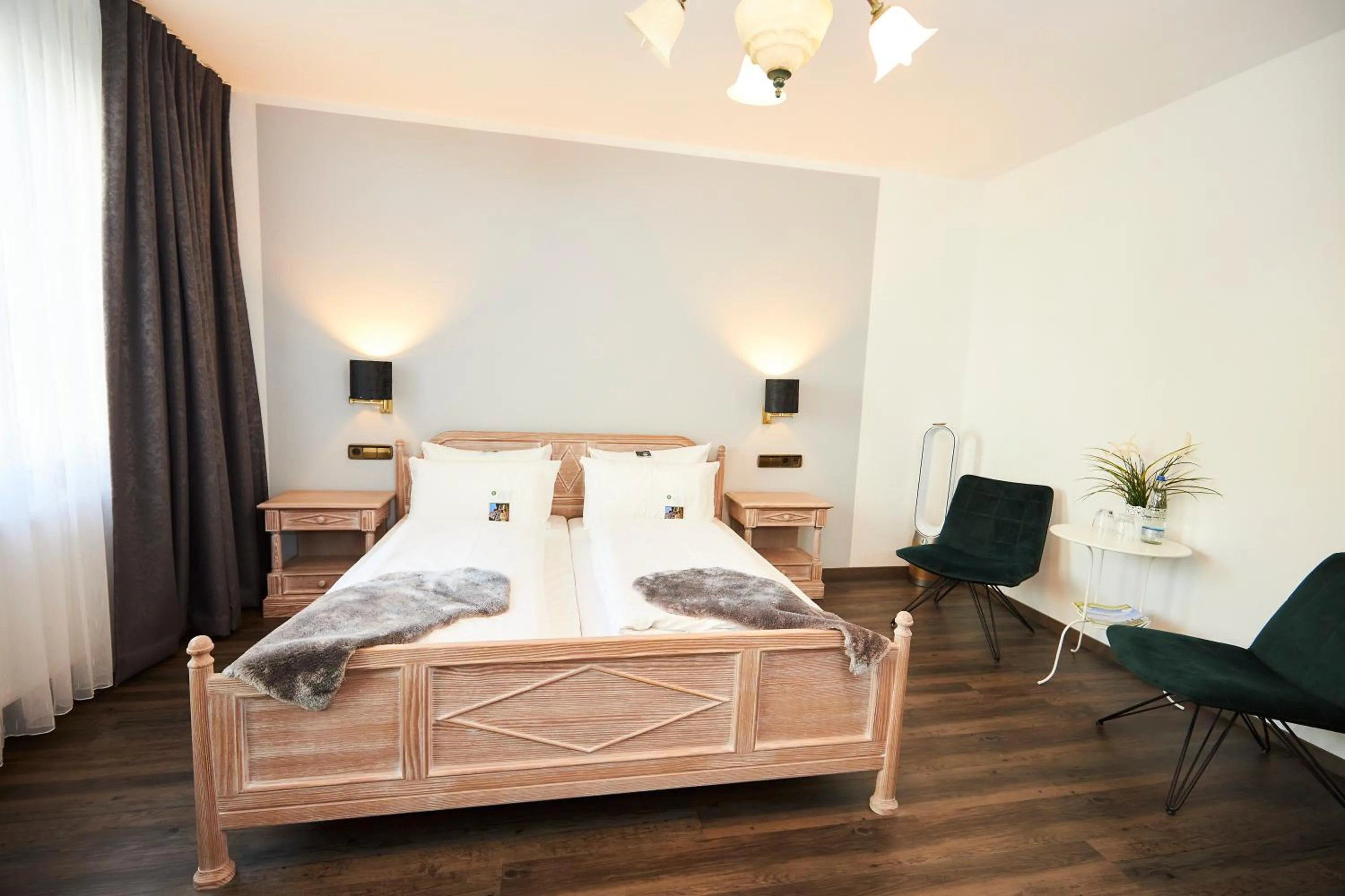 Photo of the whole room, Bed in Flair Hotel Vier Jahreszeiten