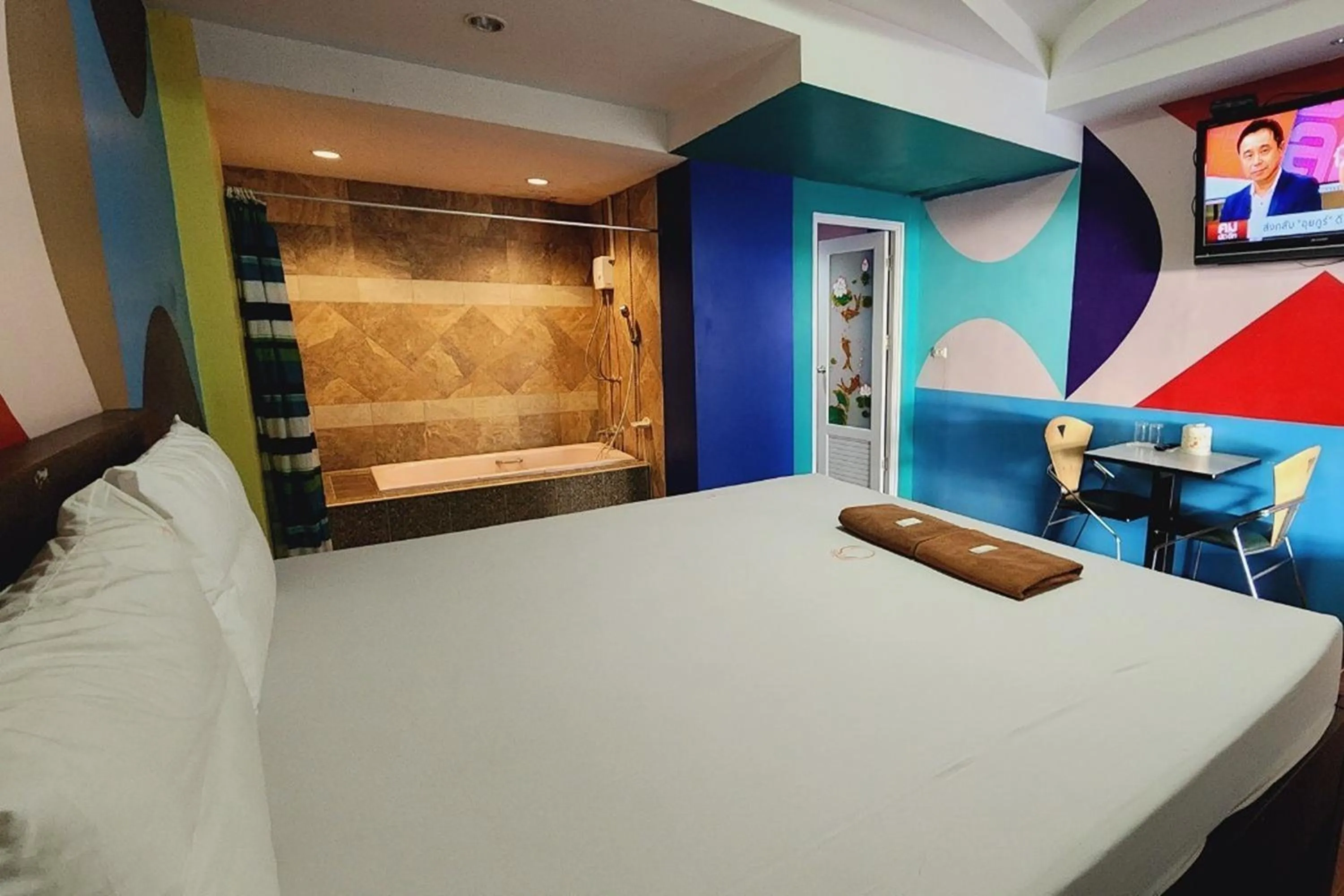 Bedroom in Chompoo Inn