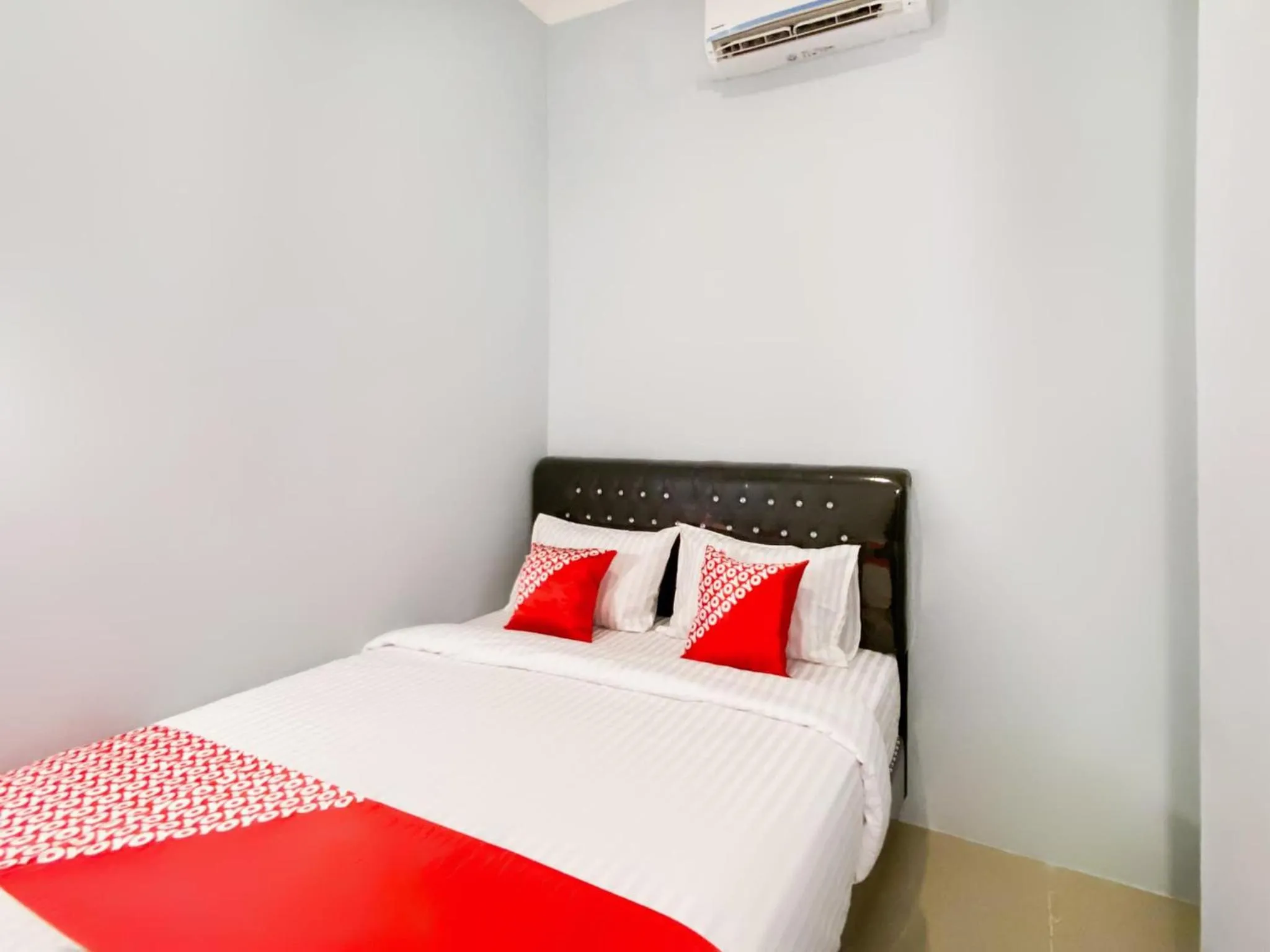 Bedroom in Hotel O Guesthouse Pagi Sore Syariah