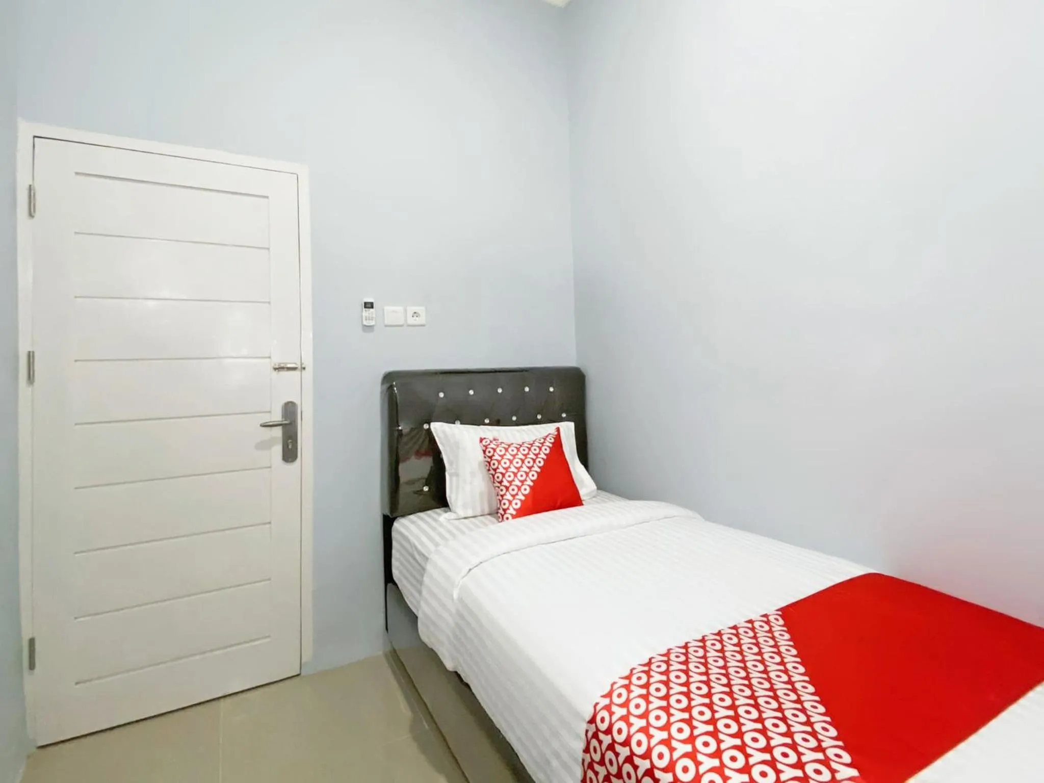 Bedroom in Hotel O Guesthouse Pagi Sore Syariah