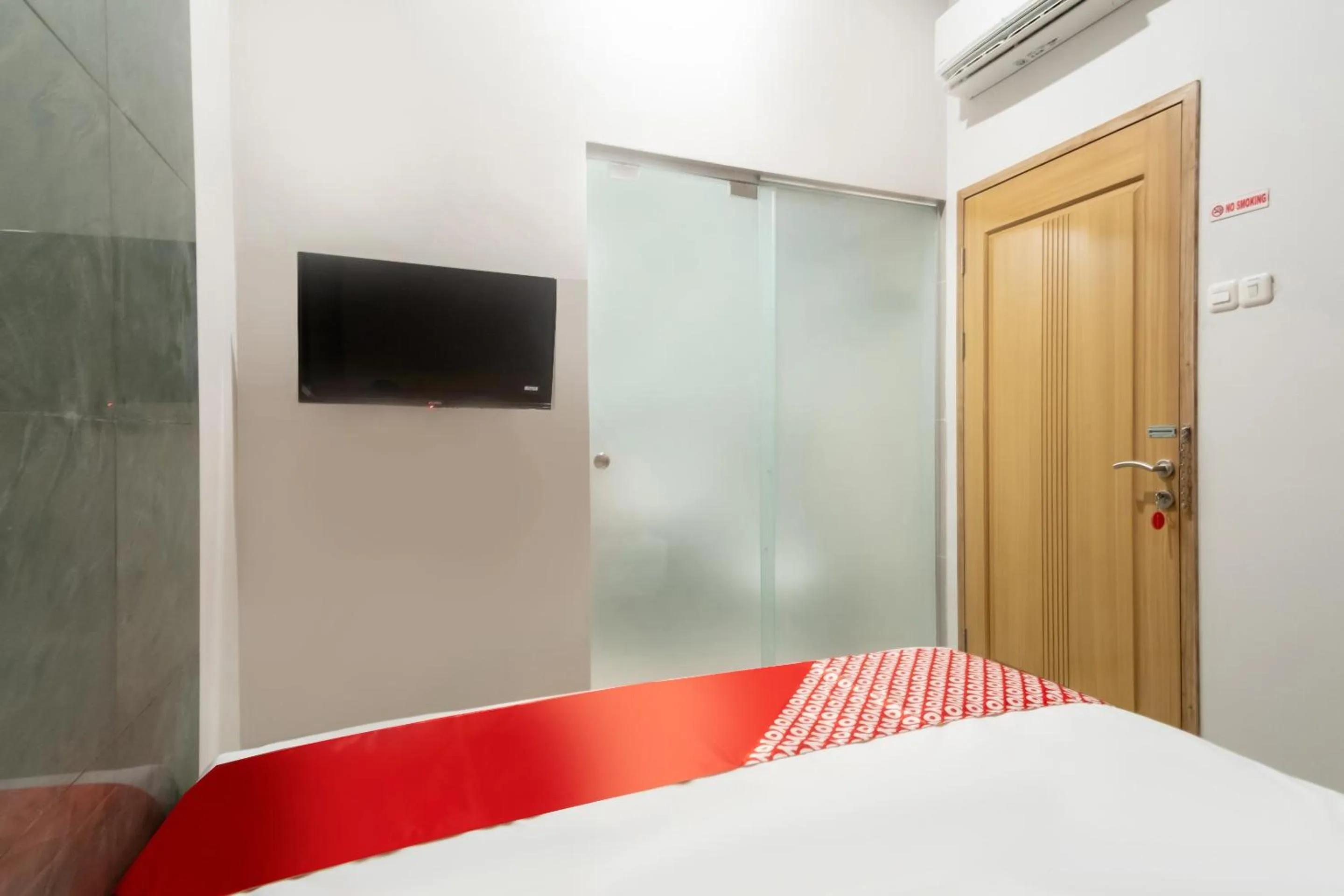 Bedroom, Bed in Hotel O Festive Inn